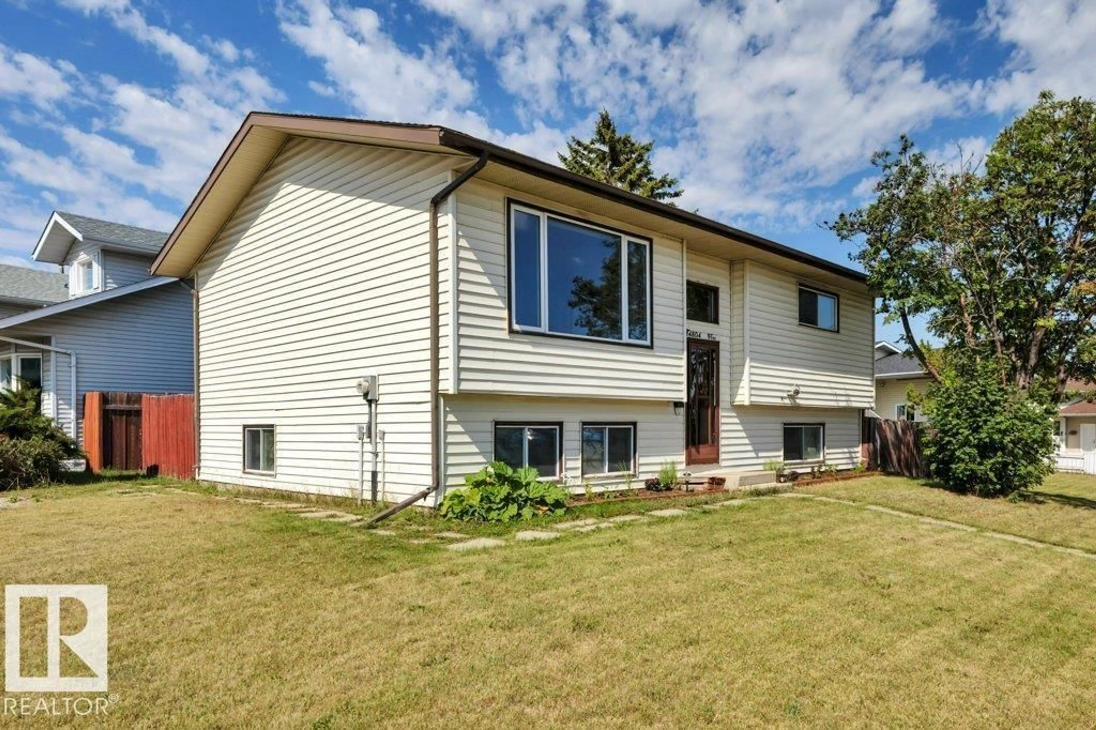 Home with vinyl exterior material, street for 14804 35 ST, Edmonton Alberta T5Y2K6