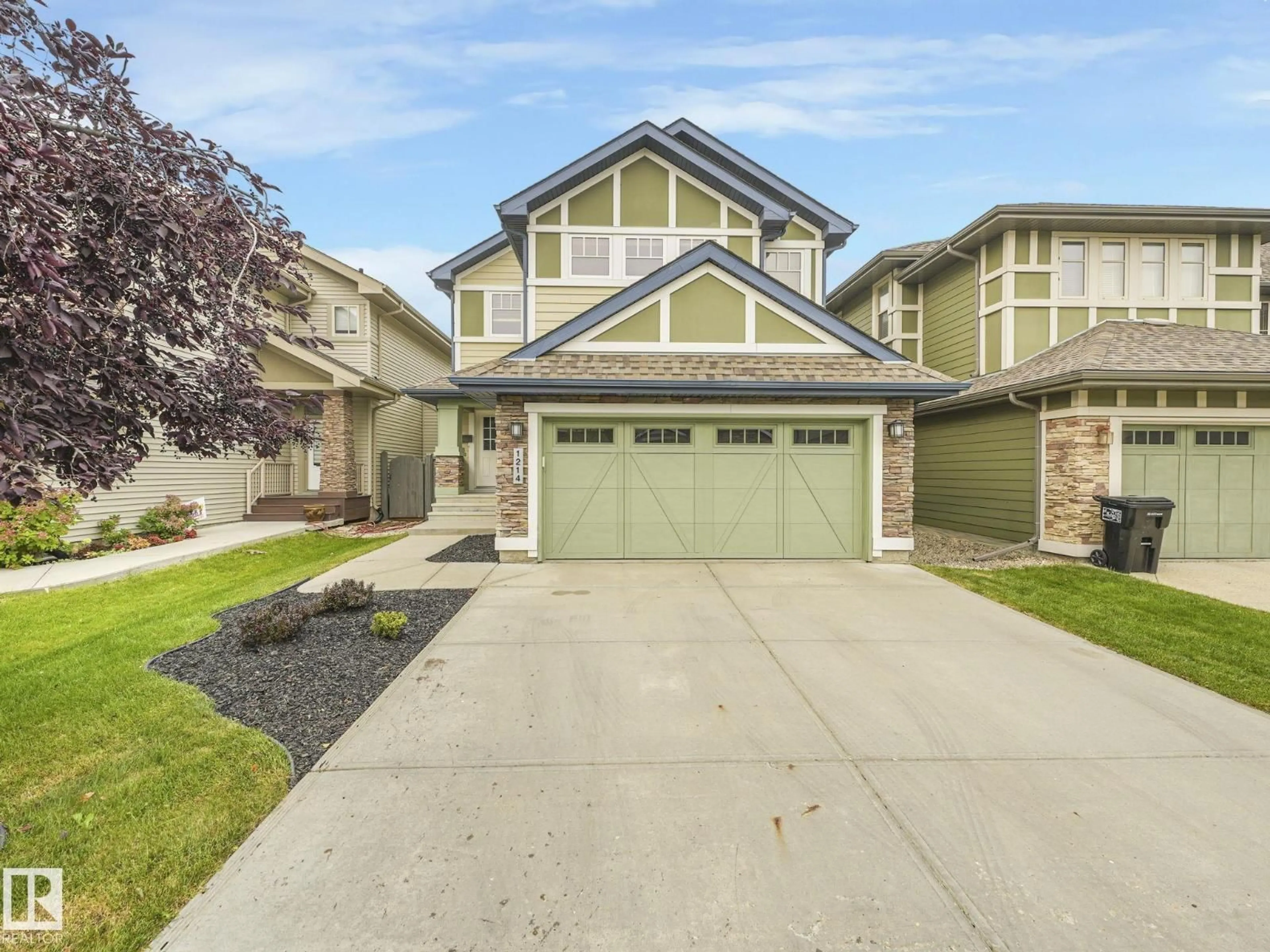 Home with vinyl exterior material, street for 1214 AINSLIE WY, Edmonton Alberta T6W0H7