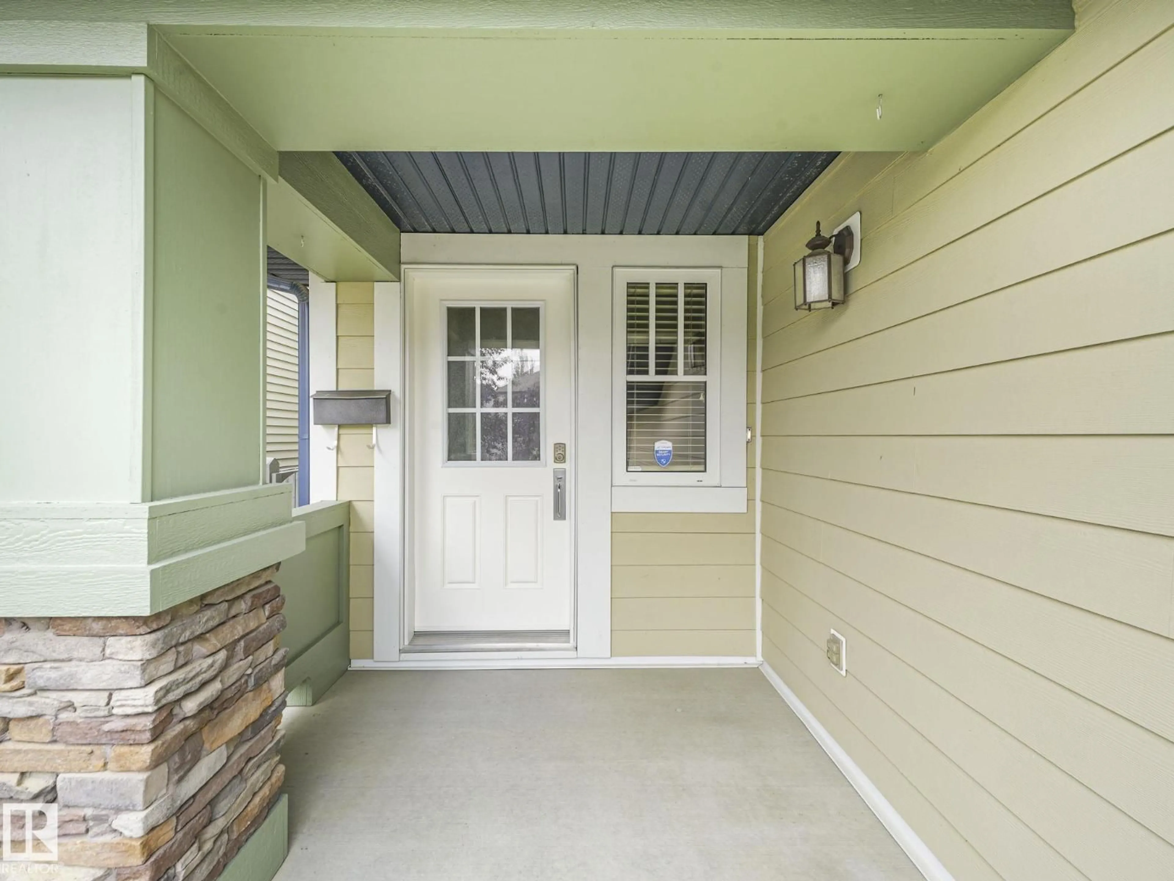 Indoor entryway for 1214 AINSLIE WY, Edmonton Alberta T6W0H7