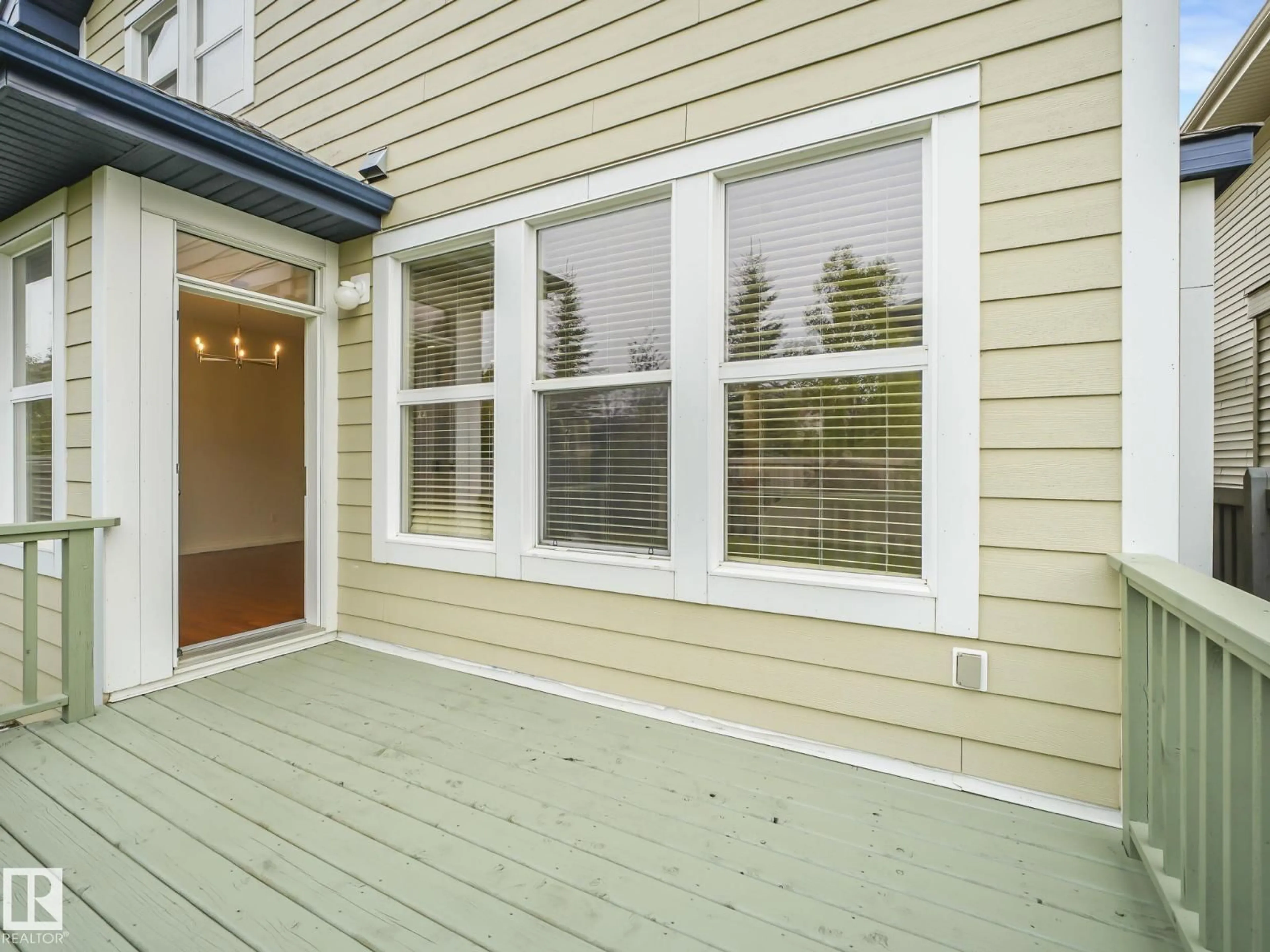 Home with vinyl exterior material, street for 1214 AINSLIE WY, Edmonton Alberta T6W0H7