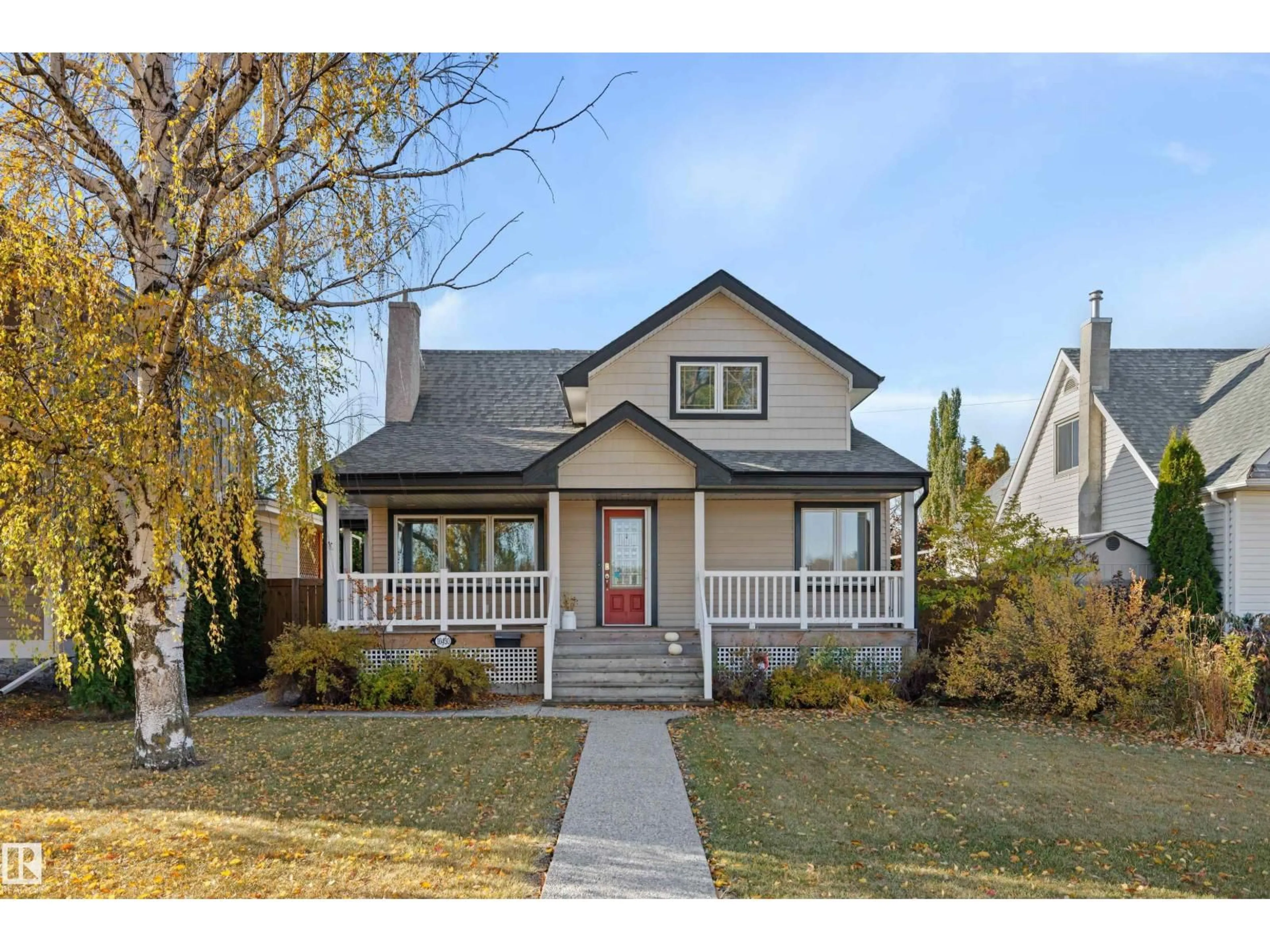 Home with vinyl exterior material, street for NW - 10430 138 ST, Edmonton Alberta T5N2J4