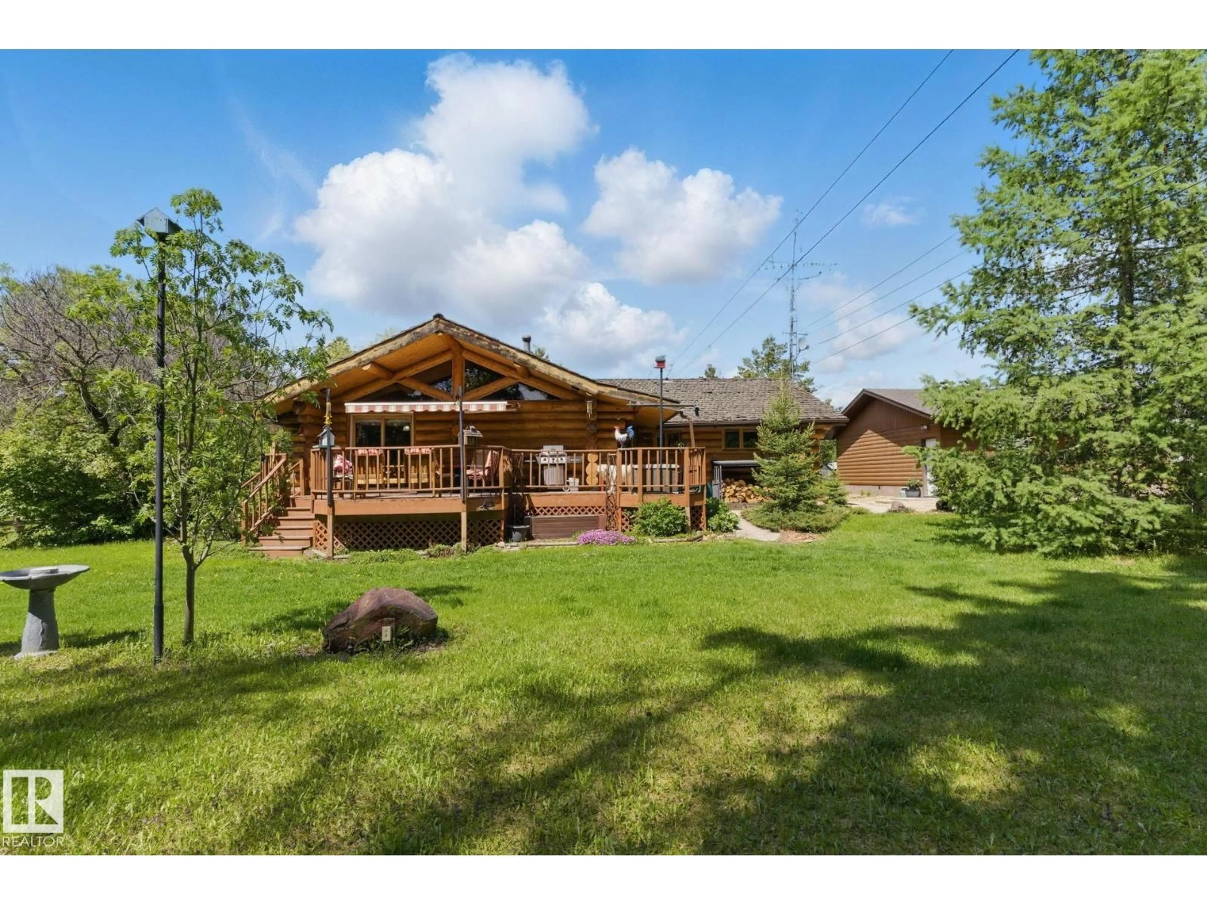 A pic from outside/outdoor area/front of a property/back of a property/a pic from drone, unknown for 60029 RR 40, Rural Barrhead County Alberta T0G0E0