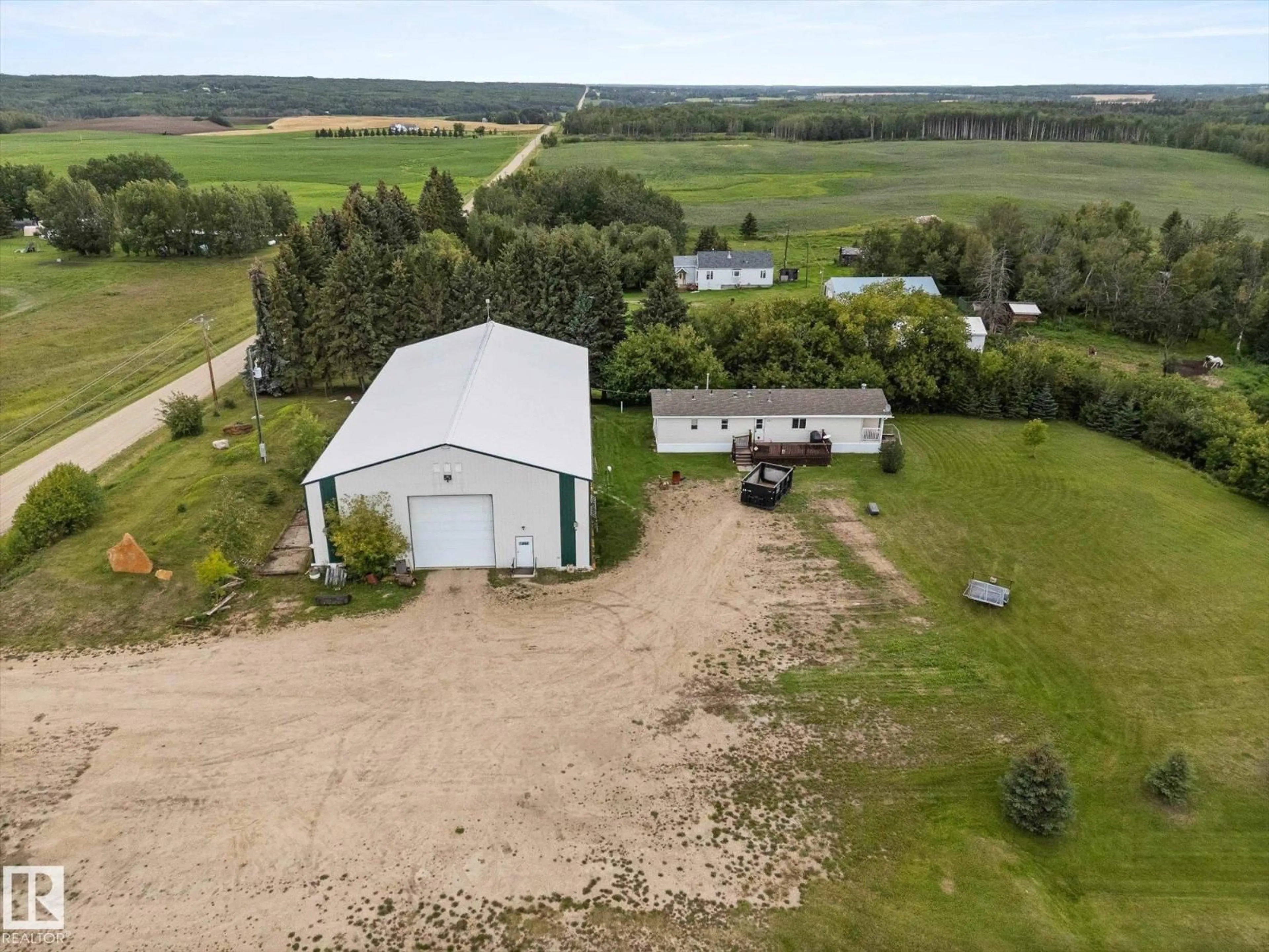 A pic from outside/outdoor area/front of a property/back of a property/a pic from drone, unknown for 1308 TWP ROAD 552, Rural Lac Ste. Anne County Alberta T0E1V0