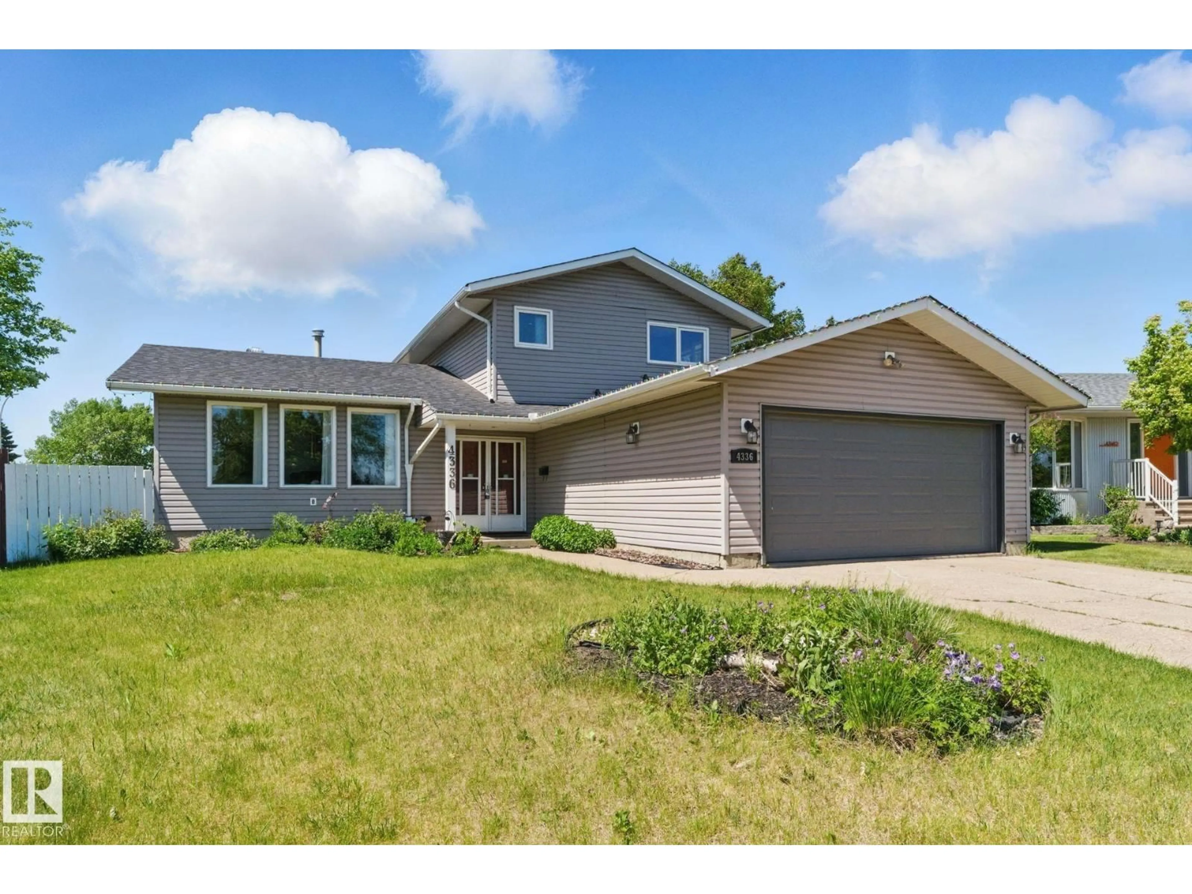 Home with vinyl exterior material, street for 4336 74 ST, Edmonton Alberta T6K0W2