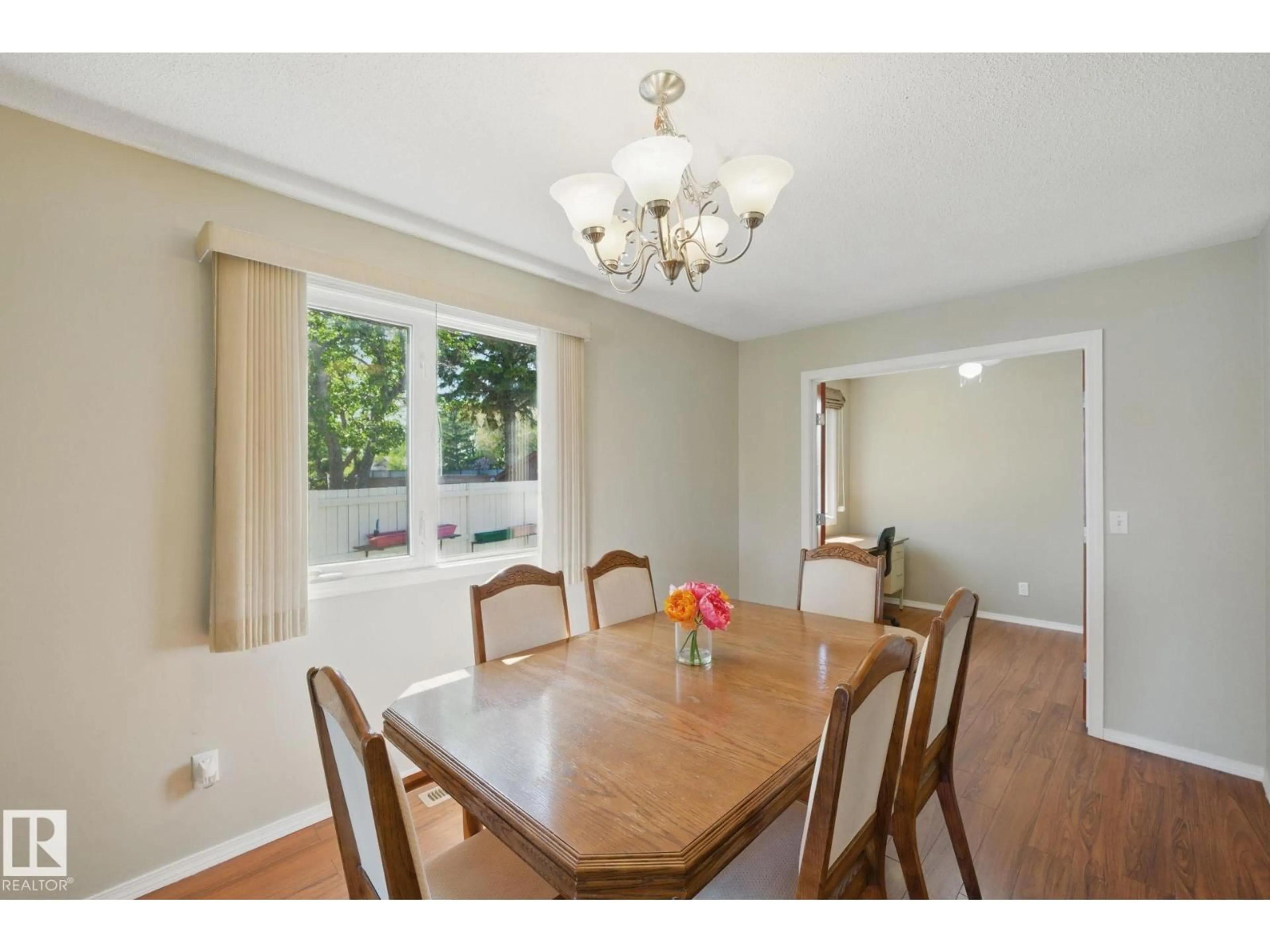 Dining room, wood/laminate floor for 4336 74 ST, Edmonton Alberta T6K0W2