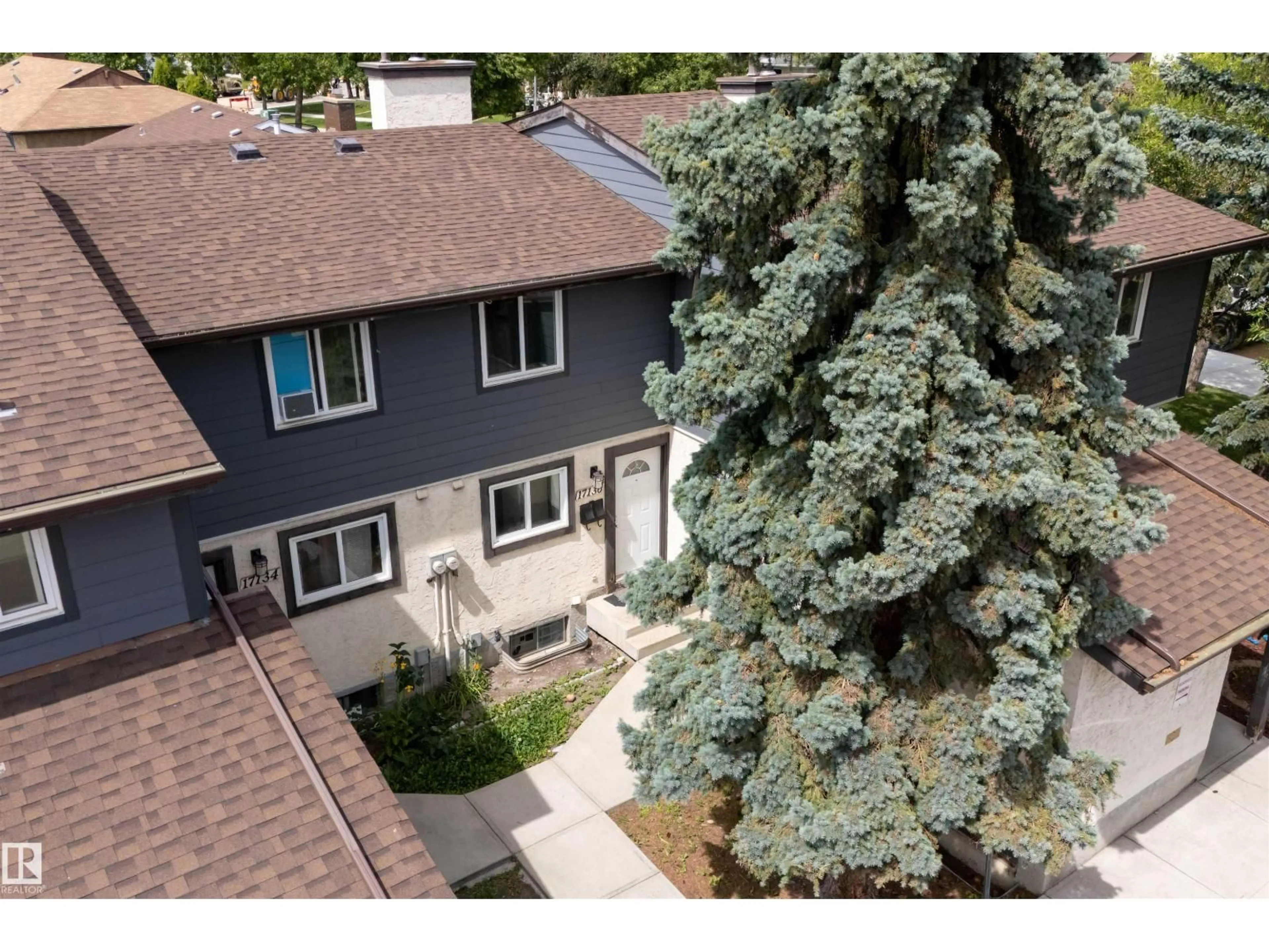 A pic from outside/outdoor area/front of a property/back of a property/a pic from drone, street for NW - 17136 100 ST, Edmonton Alberta T5X5H3