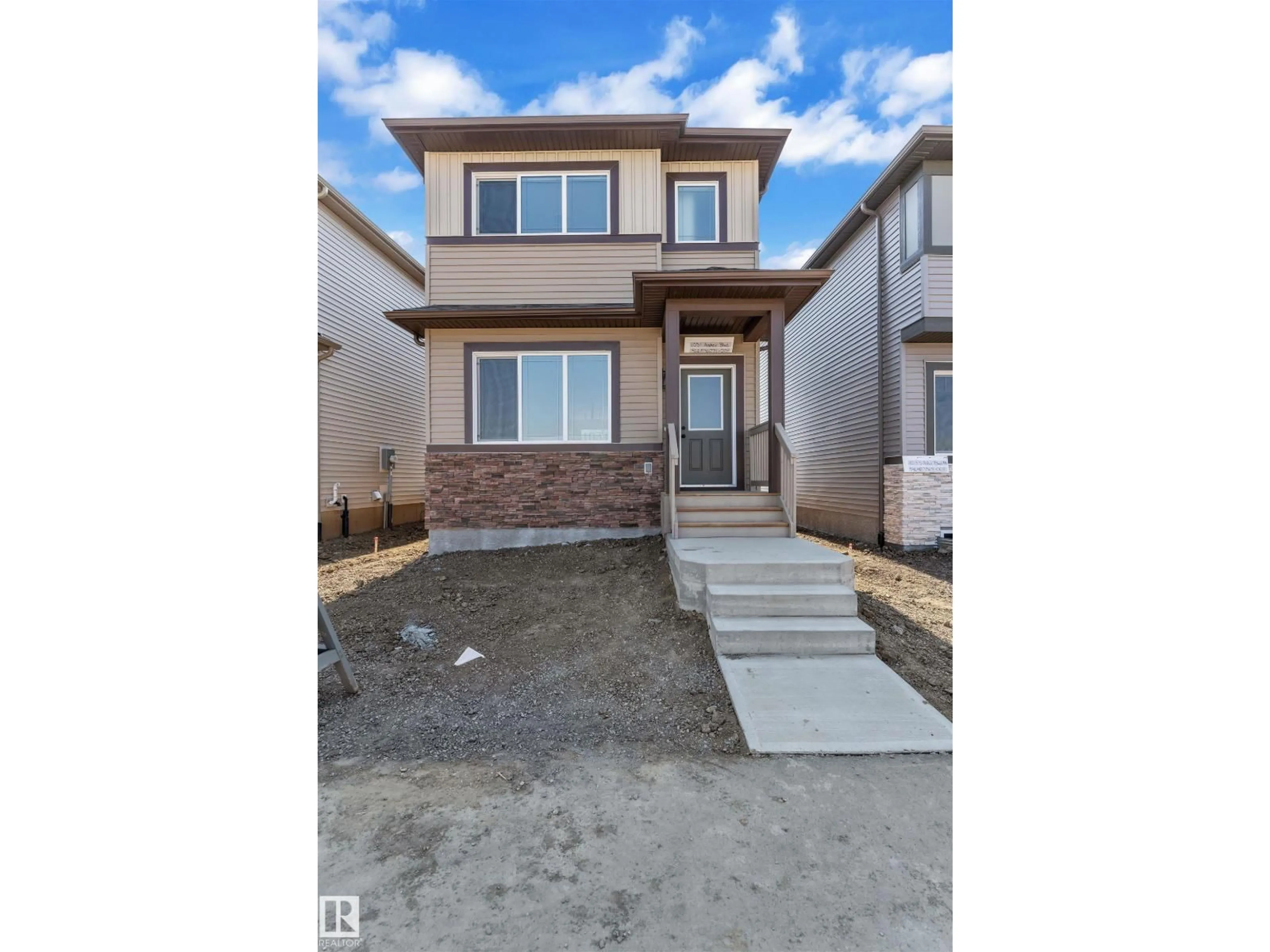 Home with vinyl exterior material, street for 1031 ASTER BV, Edmonton Alberta T6T2W7