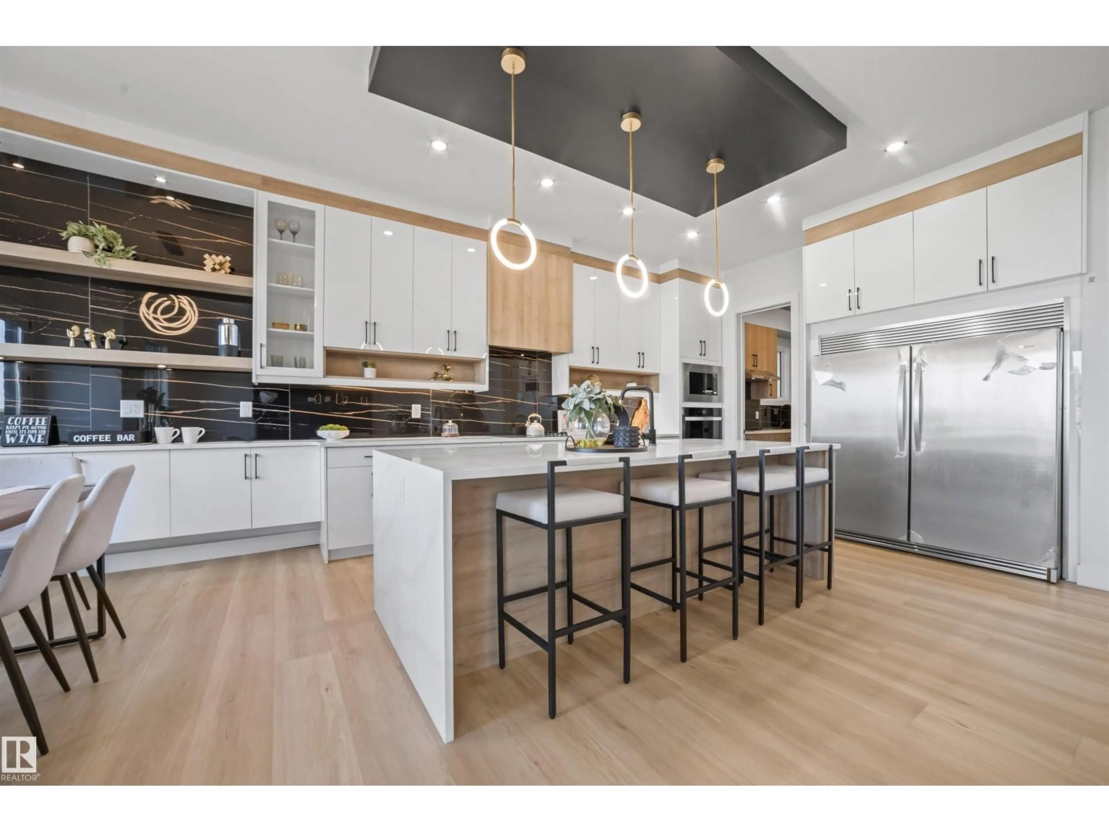 Open concept kitchen, wood/laminate floor for NE - 724 166 AV, Edmonton Alberta T5Y4J1