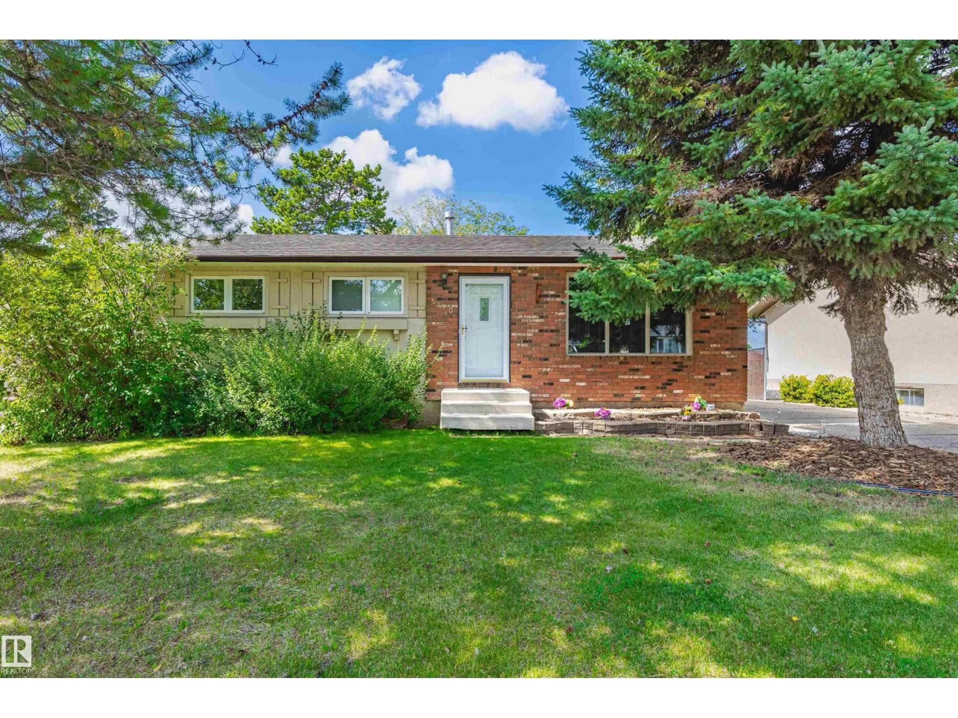 Home with vinyl exterior material, street for 5120 53 ST, Bon Accord Alberta T0A0K0