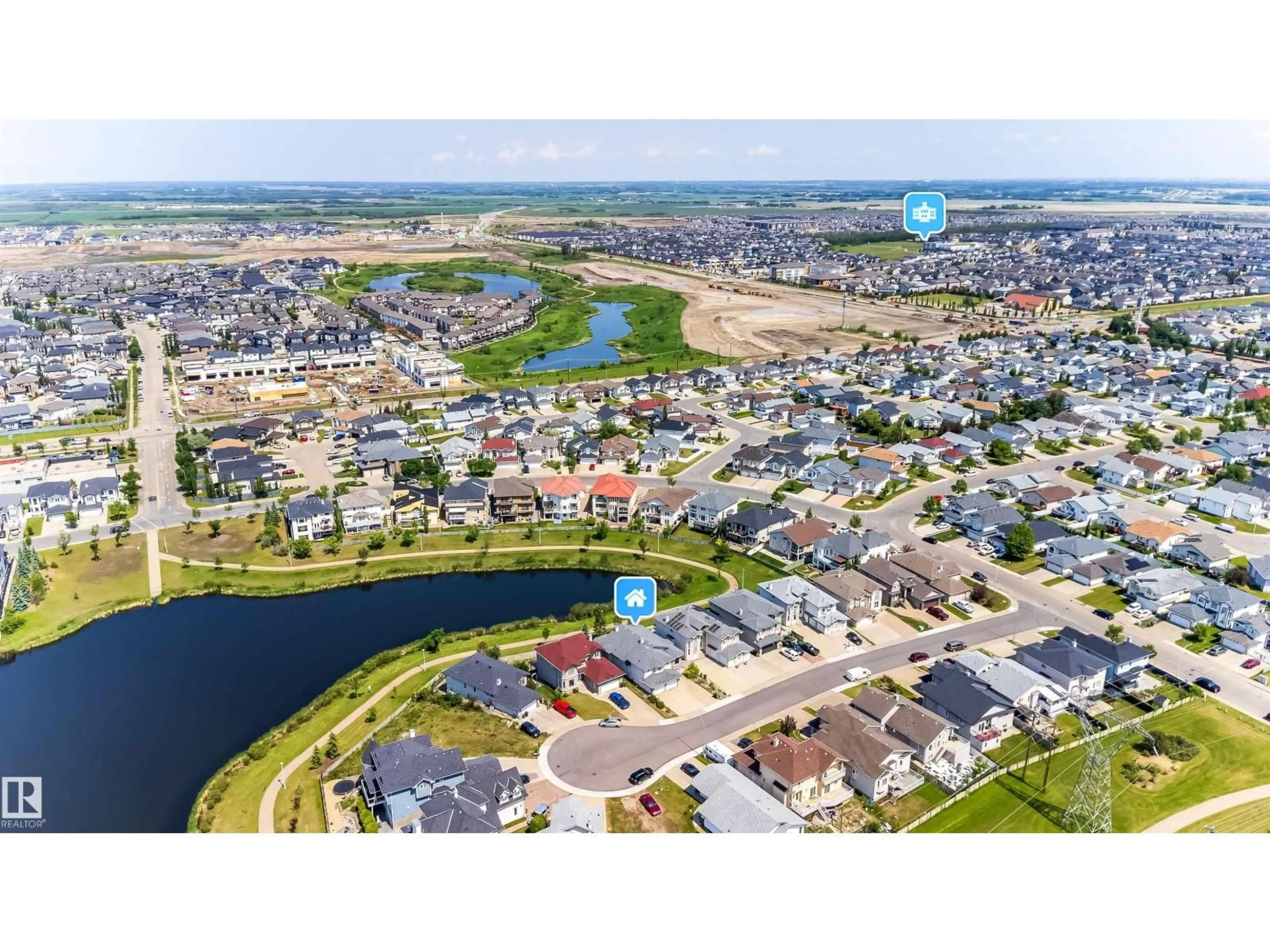 A pic from outside/outdoor area/front of a property/back of a property/a pic from drone, water/lake/river/ocean view for 6928 164 AV, Edmonton Alberta T5Z3R3