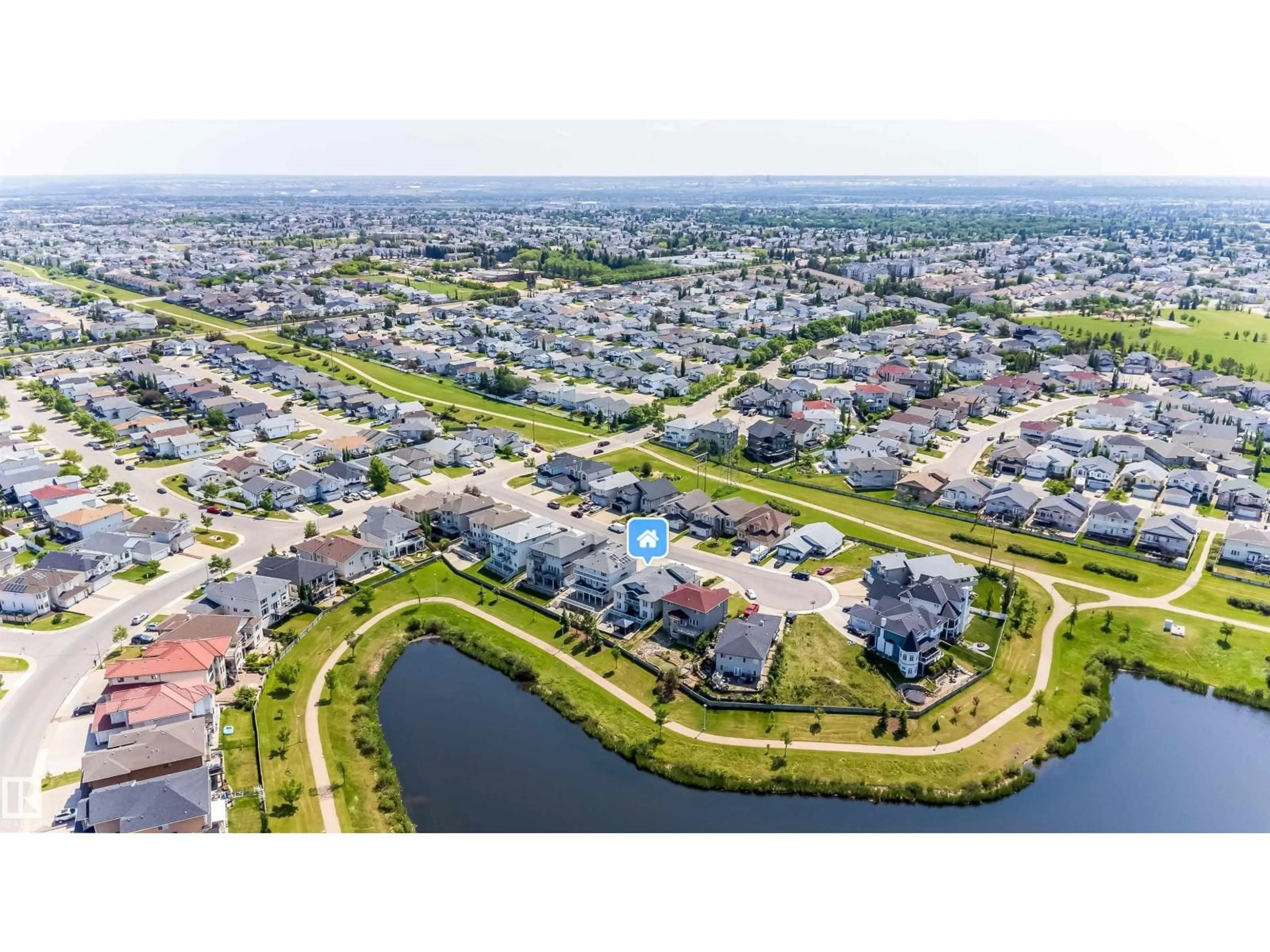 A pic from outside/outdoor area/front of a property/back of a property/a pic from drone, water/lake/river/ocean view for 6928 164 AV, Edmonton Alberta T5Z3R3