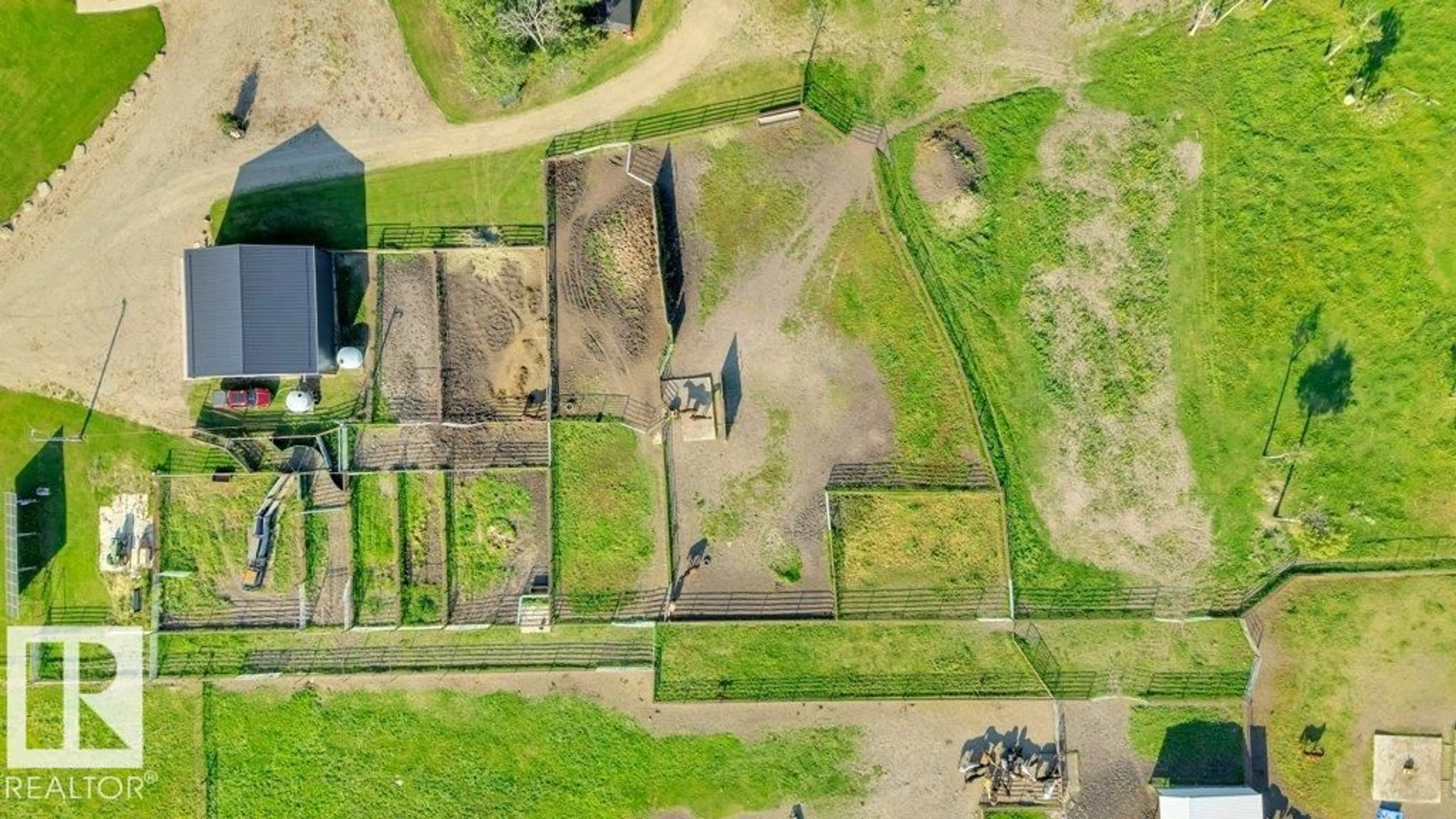A pic from outside/outdoor area/front of a property/back of a property/a pic from drone, building for 32022 HWY 611, Rural Ponoka County Alberta T0C0M0