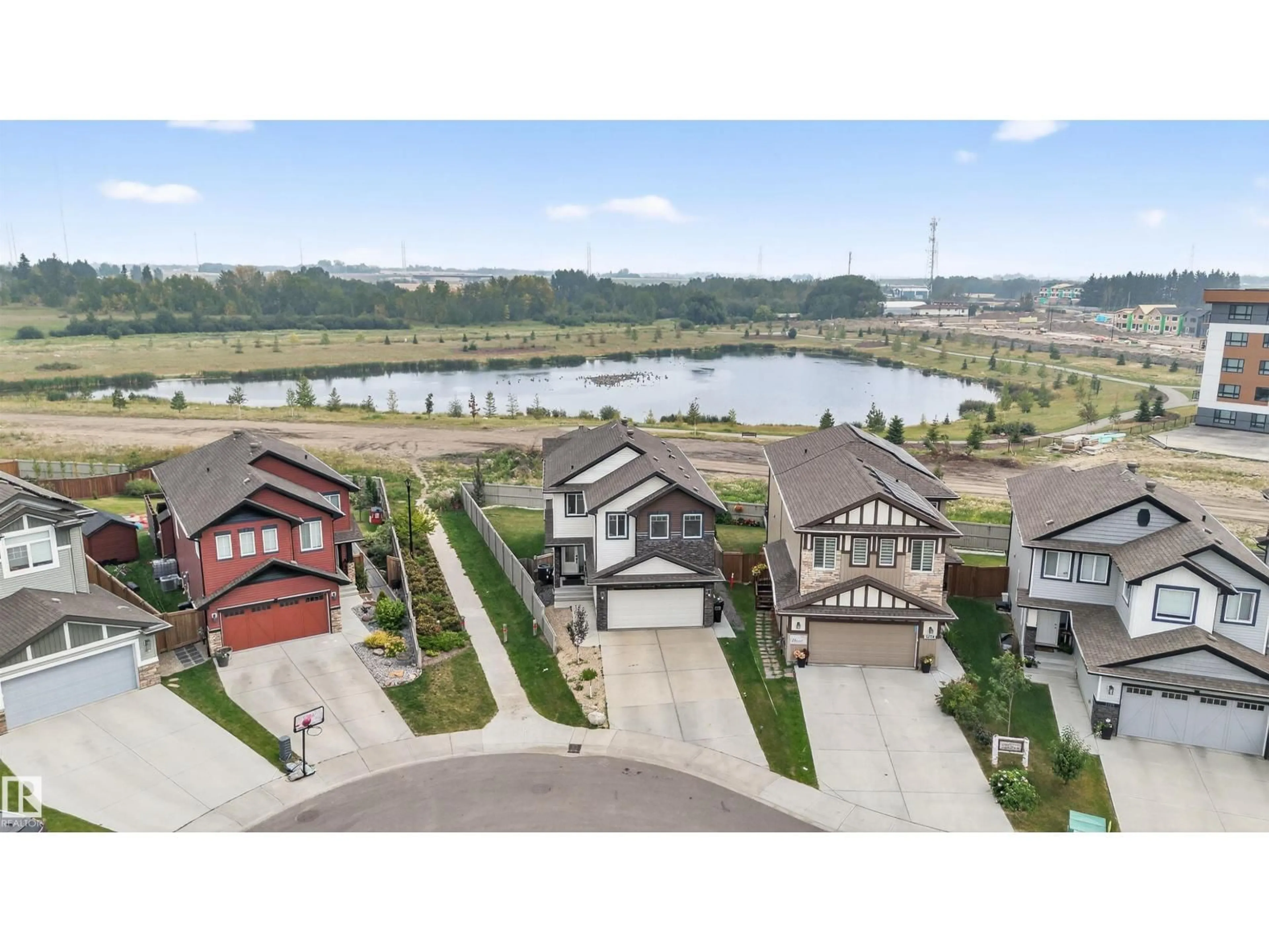A pic from outside/outdoor area/front of a property/back of a property/a pic from drone, water/lake/river/ocean view for 1215 24 AV, Edmonton Alberta T6T2E4