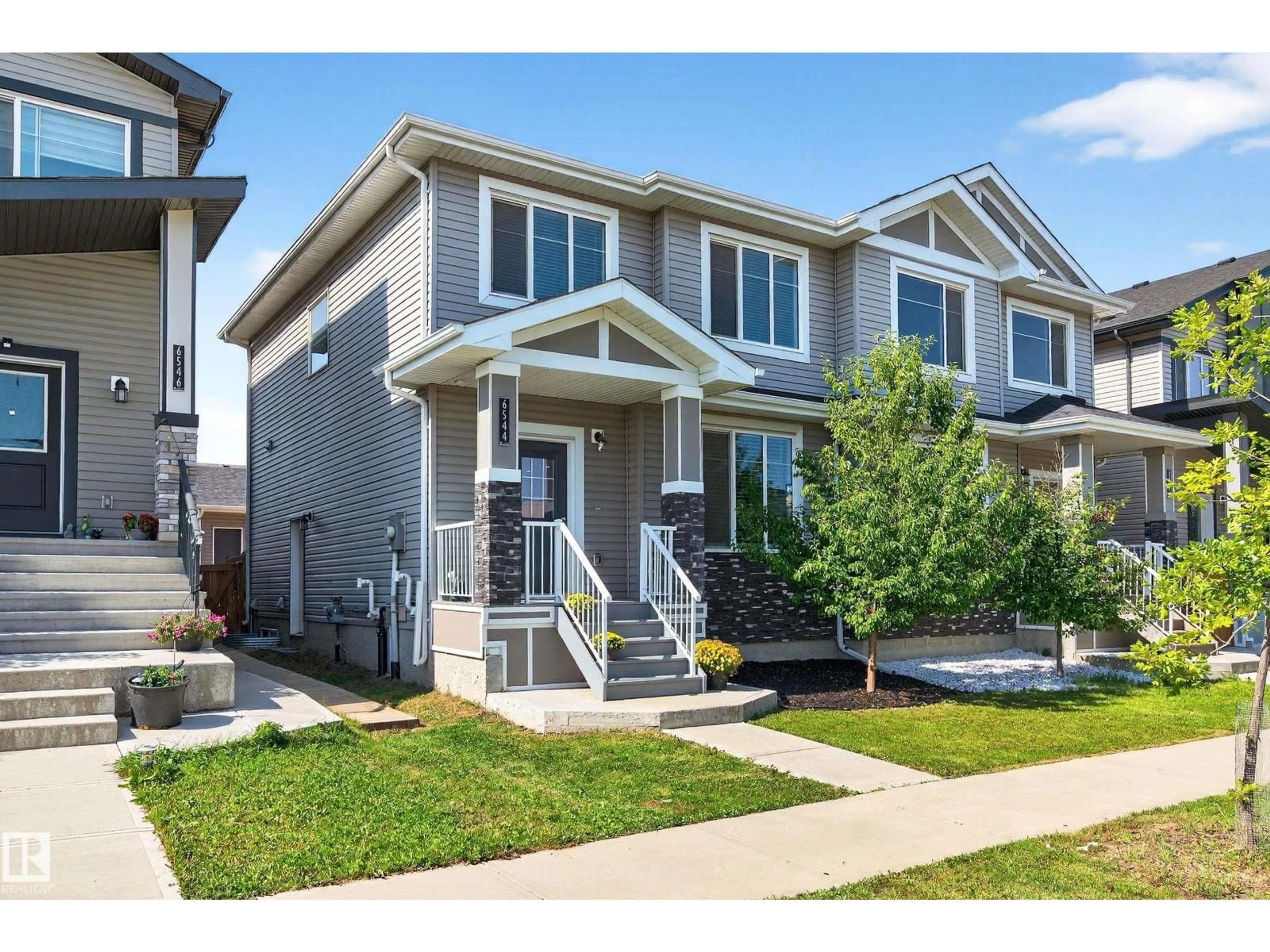 Home with vinyl exterior material, street for 6544 CHAPPELLE VS, Edmonton Alberta T6W4A3