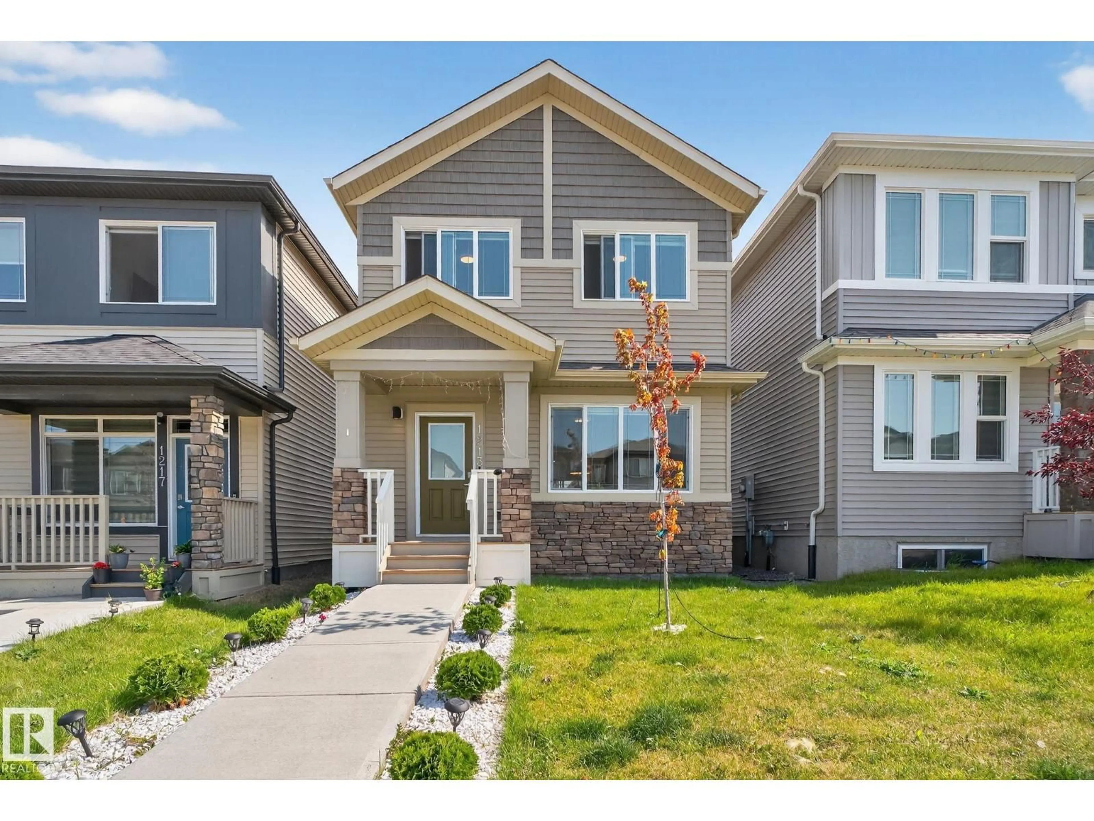 Home with vinyl exterior material, street for 1213 16A ST, Edmonton Alberta T6T2S5