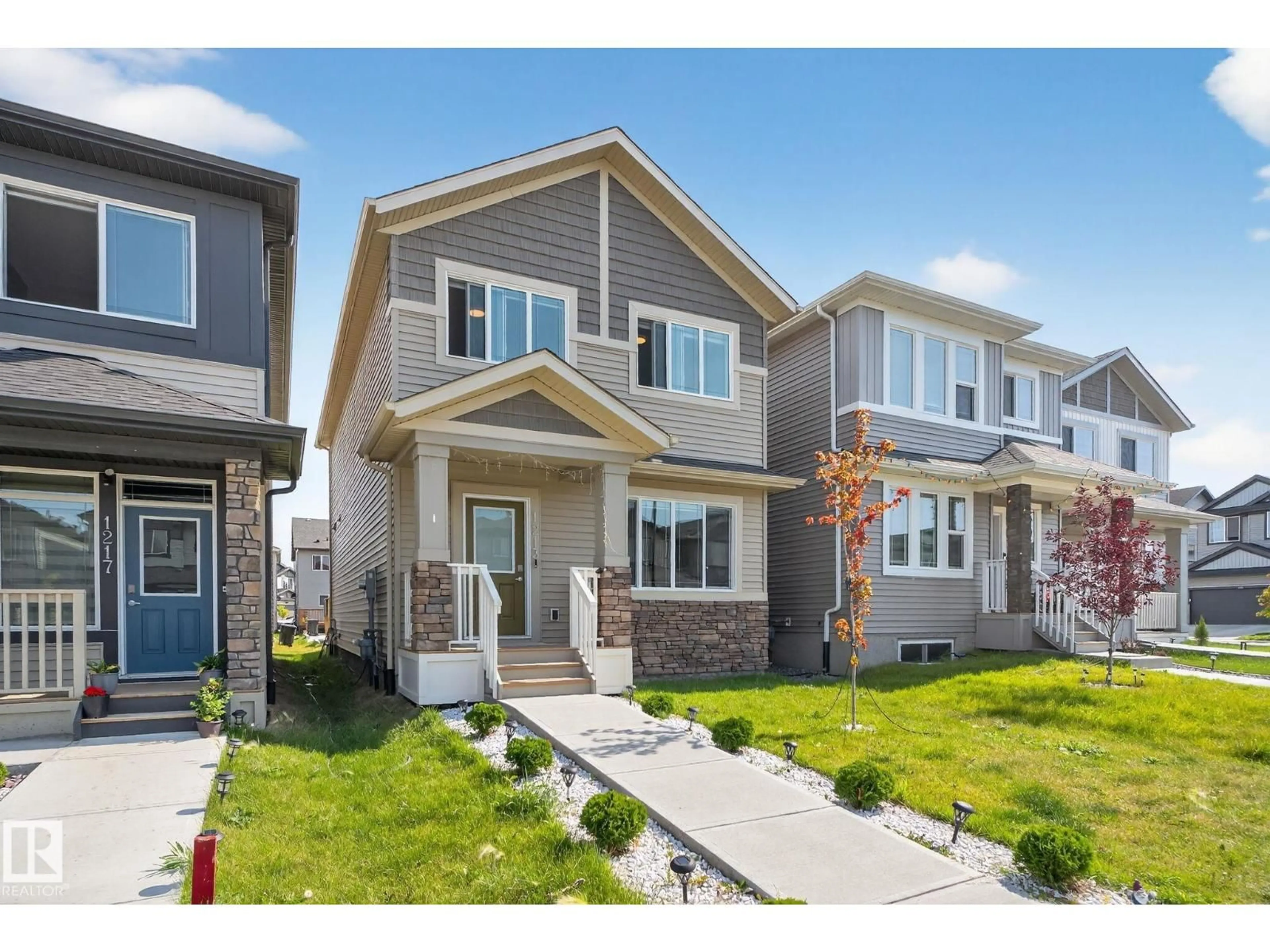 Home with brick exterior material, street for 1213 16A ST, Edmonton Alberta T6T2S5