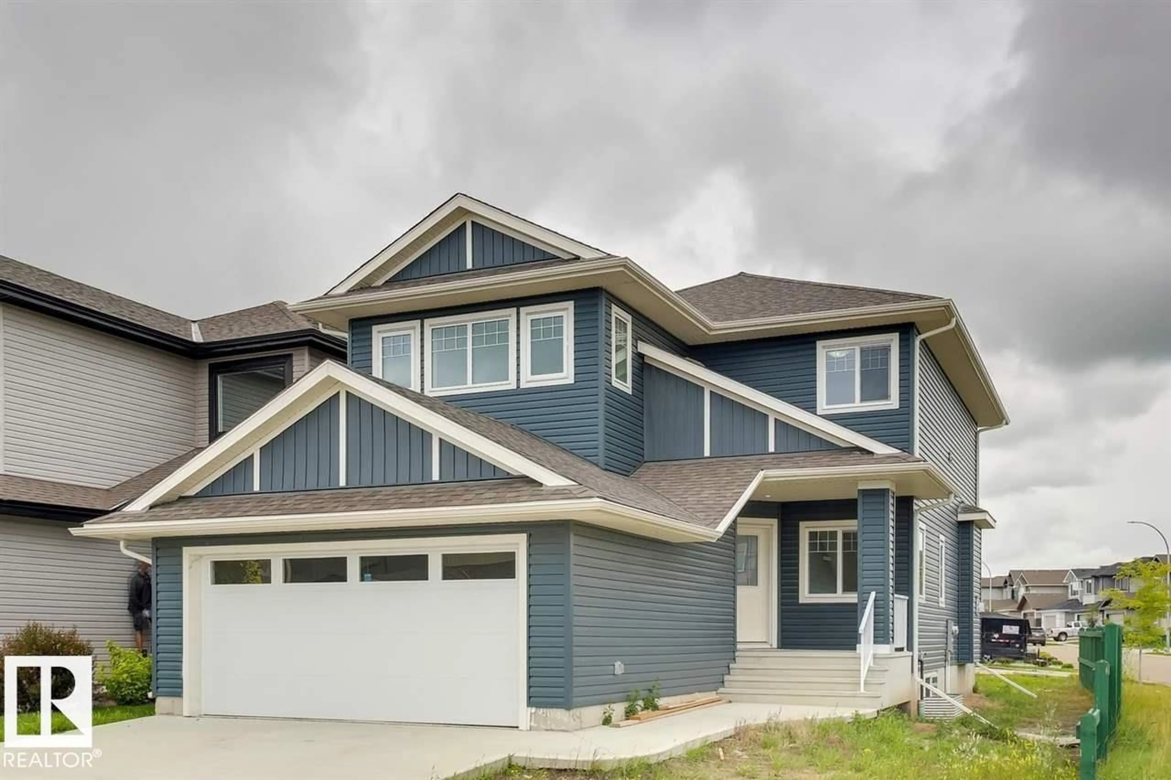 Home with vinyl exterior material, street for 1 WILLOW LI, Fort Saskatchewan Alberta T8L0L6