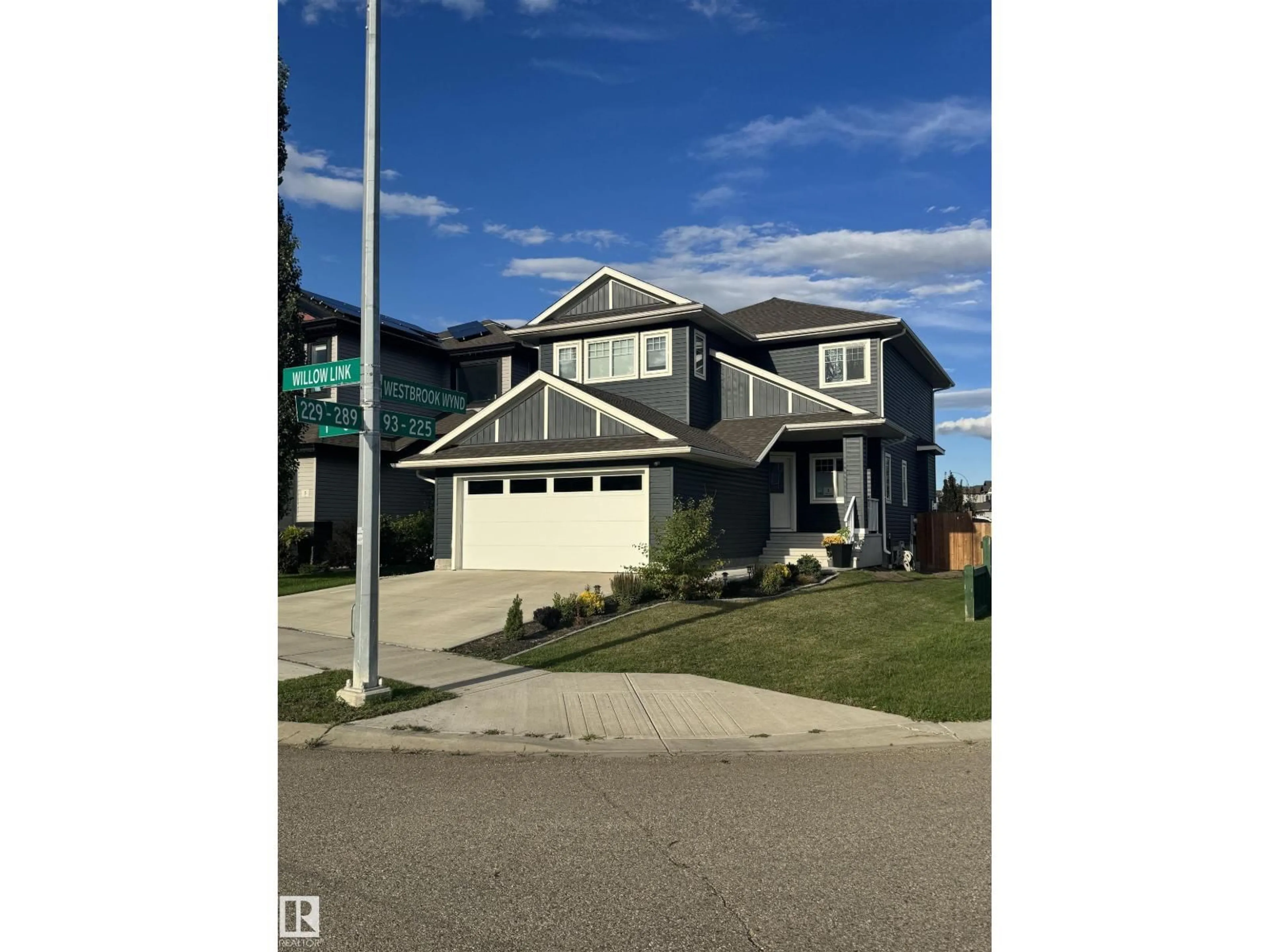 Home with vinyl exterior material, street for 1 WILLOW LI, Fort Saskatchewan Alberta T8L0L6