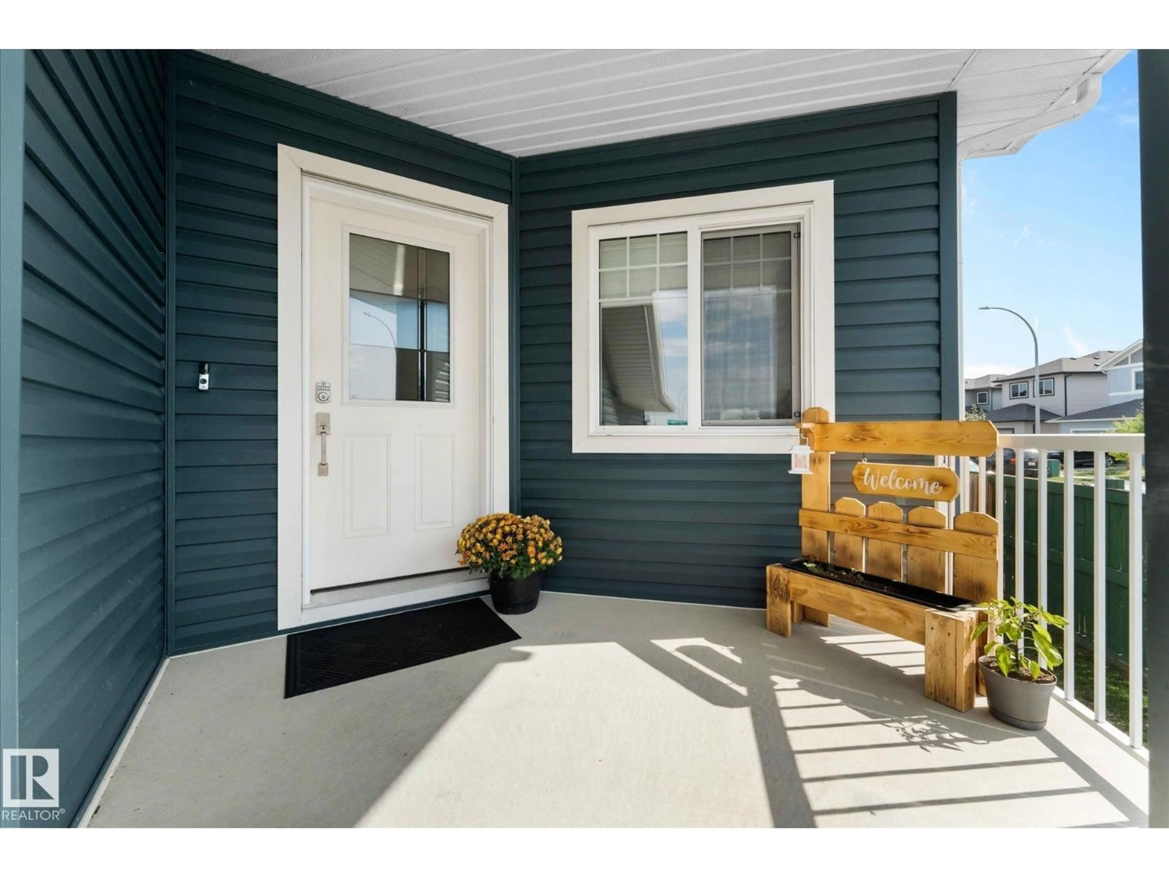 Home with vinyl exterior material, street for 1 WILLOW LI, Fort Saskatchewan Alberta T8L0L6