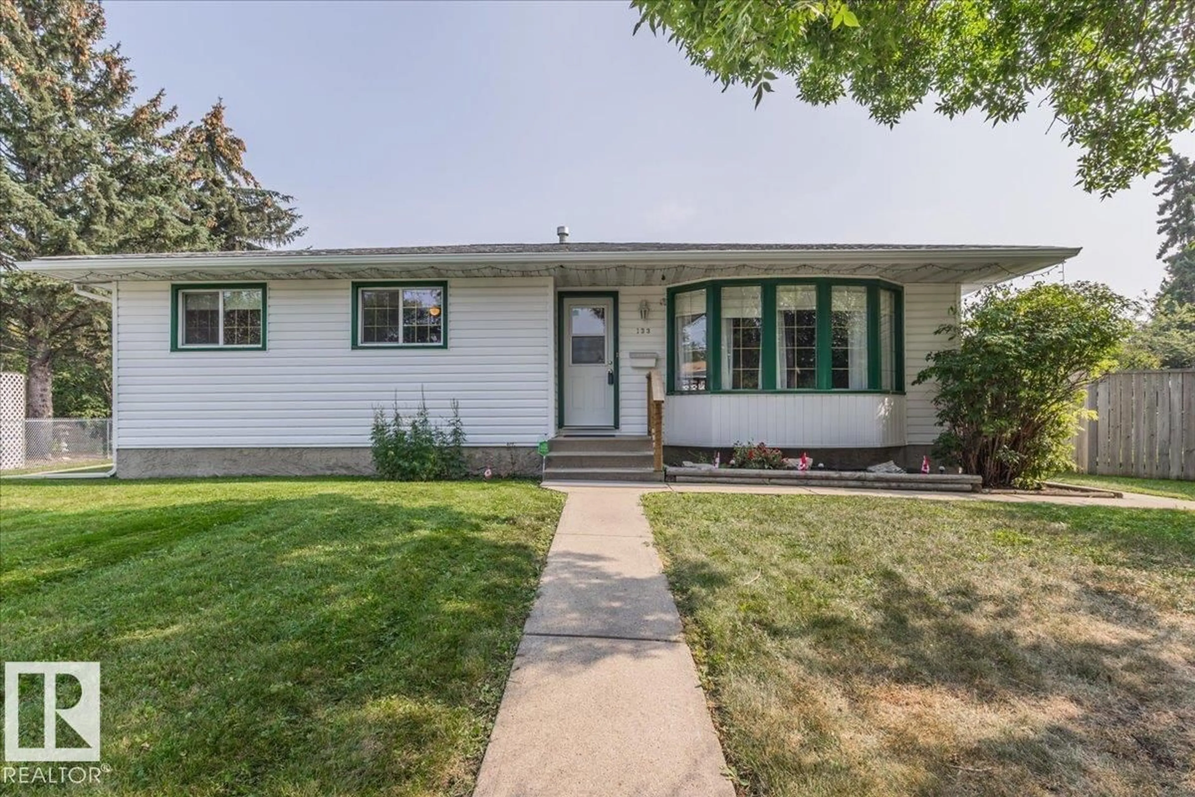 Home with vinyl exterior material, street for 133 ELM CR, Wetaskiwin Alberta T9A2C7