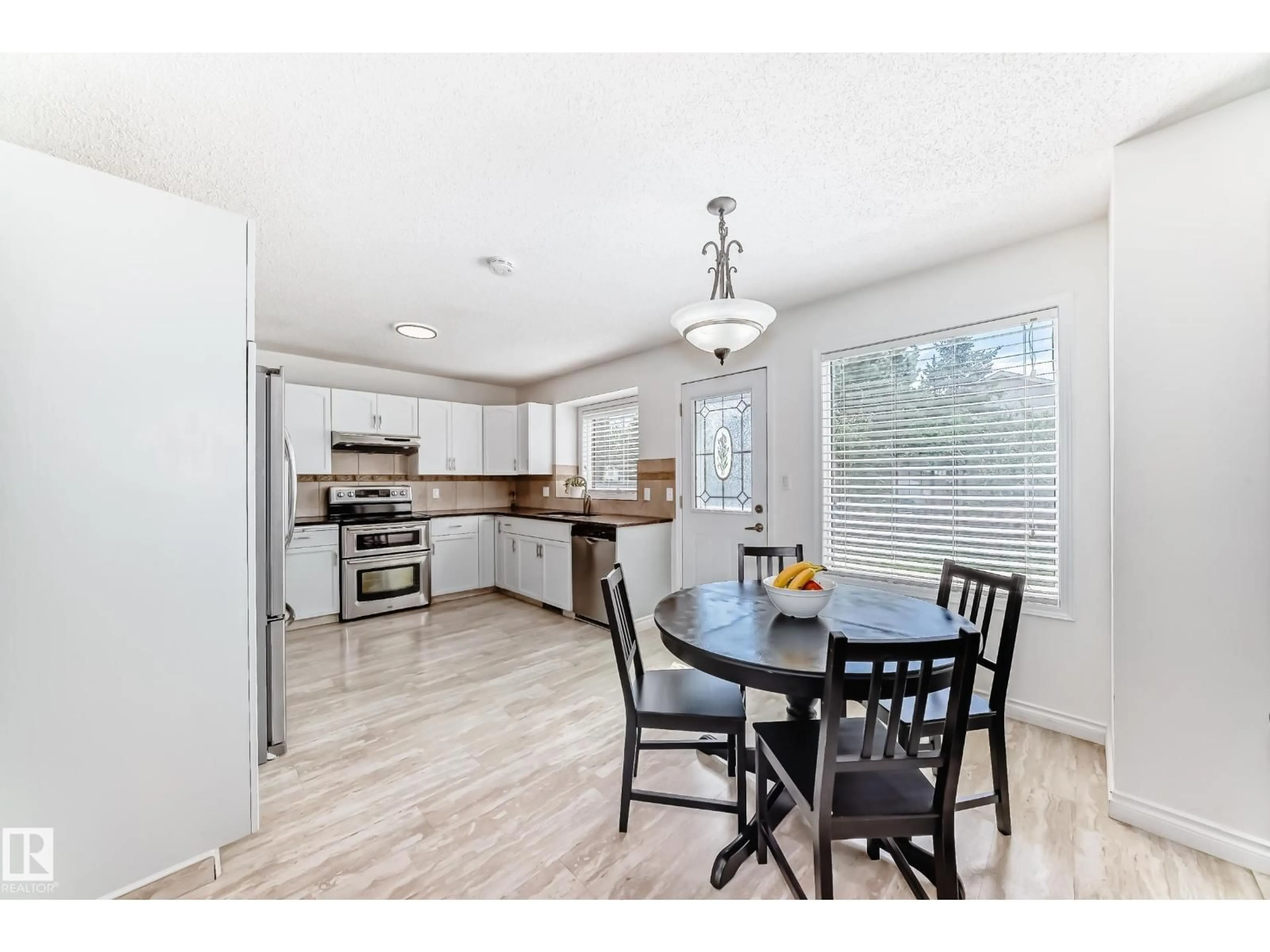 Open concept kitchen, unknown for 3155 36 AV, Edmonton Alberta T6T1H8