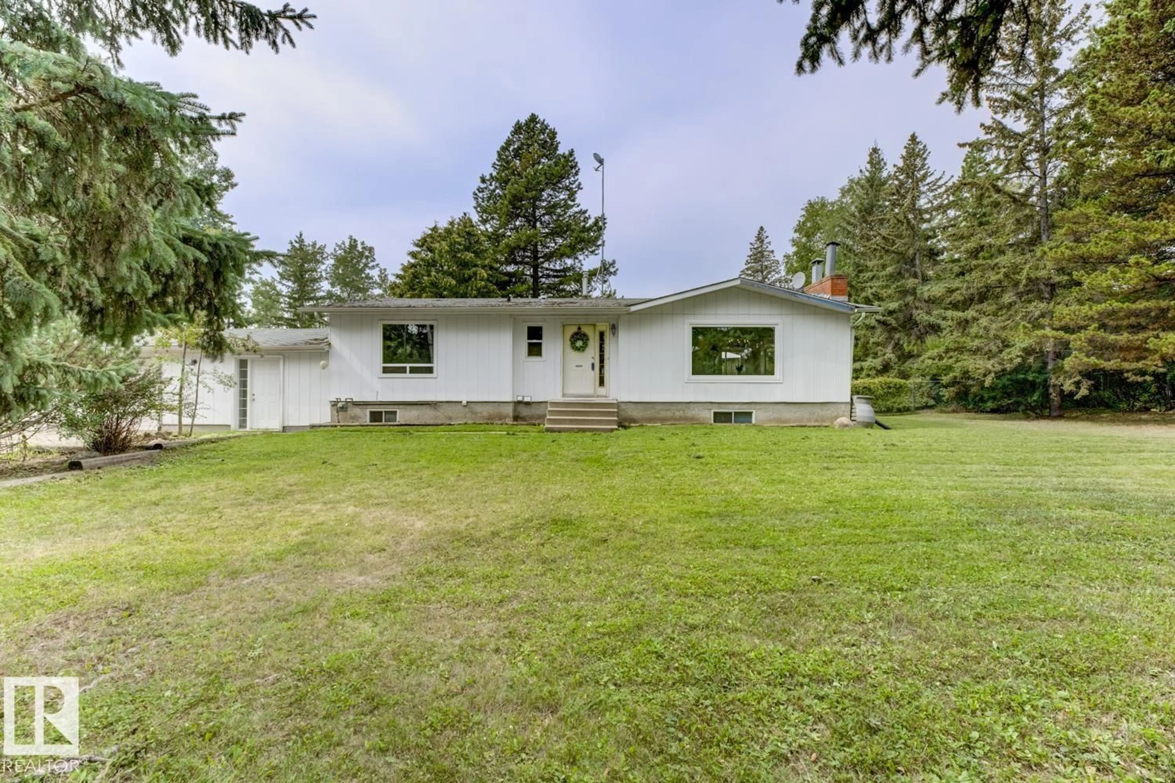 A pic from outside/outdoor area/front of a property/back of a property/a pic from drone, unknown for #6 - 27420 TWP ROAD 540, Rural Parkland County Alberta T7X3S7