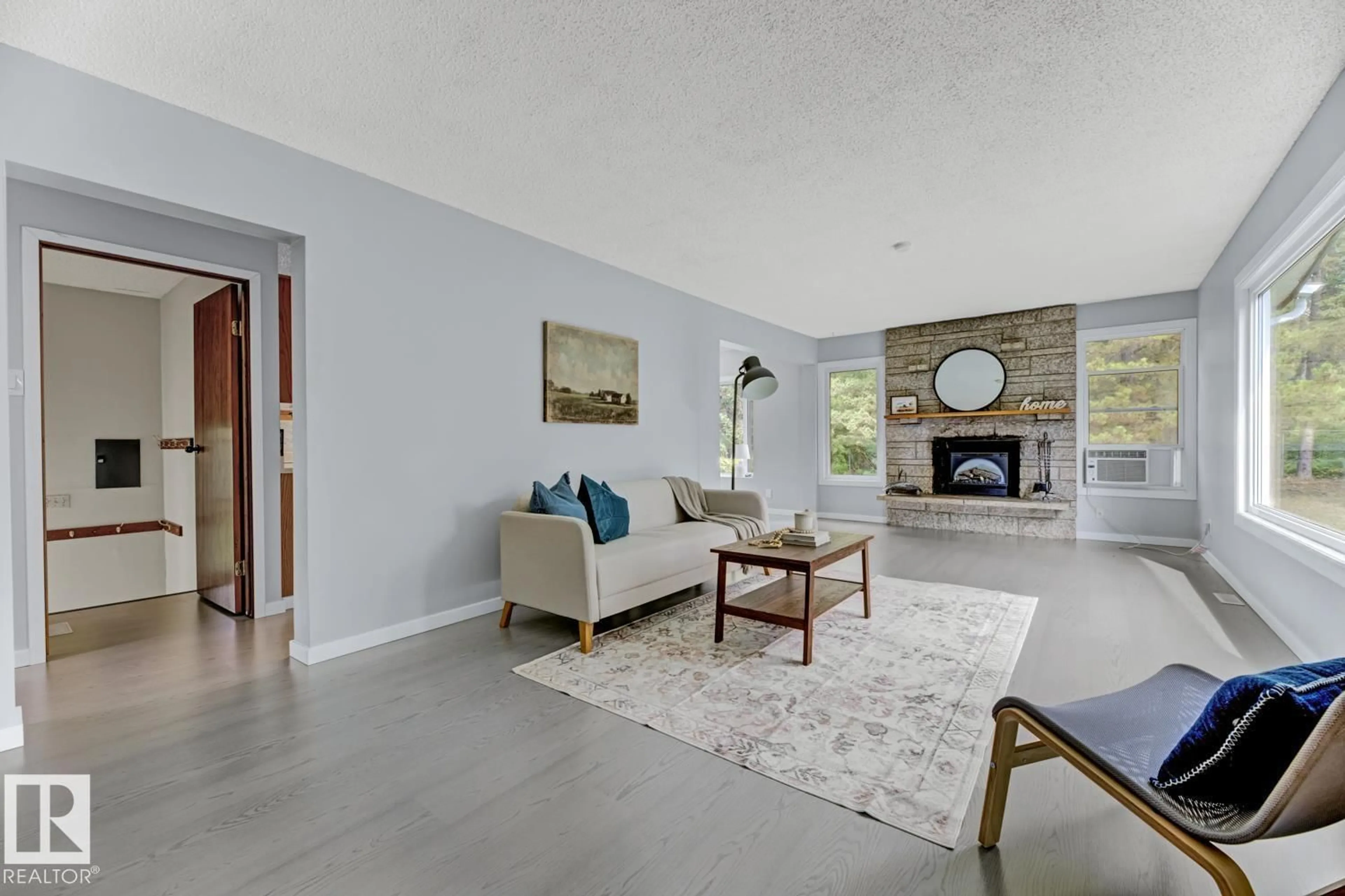 Living room with furniture, unknown for #6 - 27420 TWP ROAD 540, Rural Parkland County Alberta T7X3S7