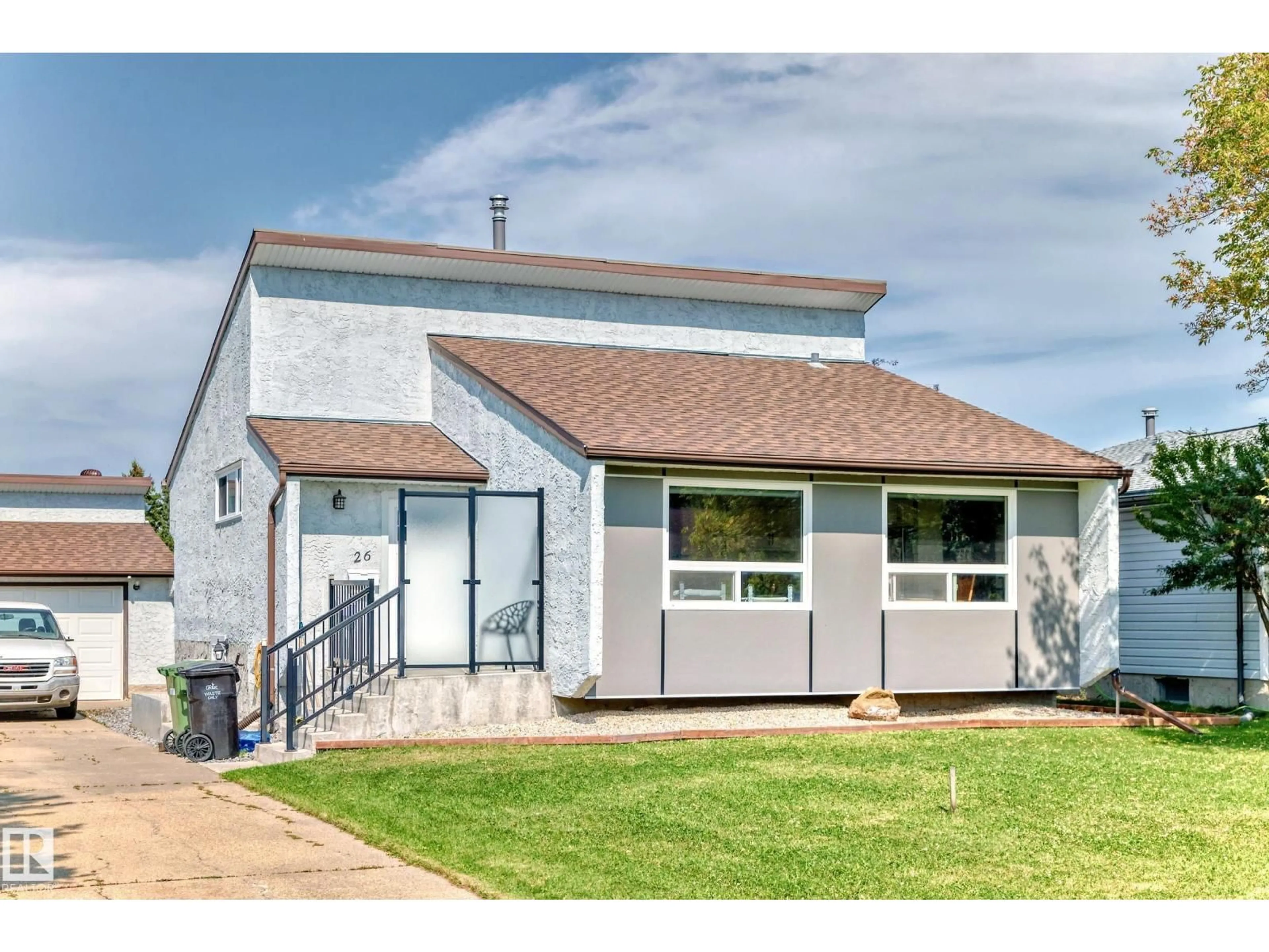 Home with vinyl exterior material, street for 26 CALEDONIA DR, Leduc Alberta T9E6C6
