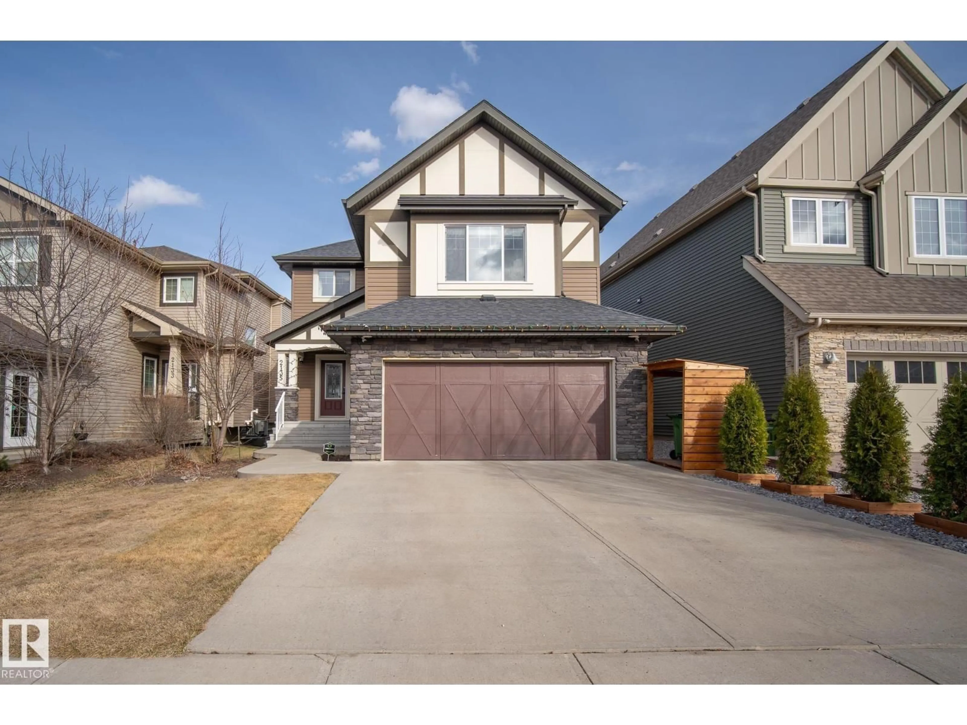Home with vinyl exterior material, street for 2135 GLENRIDDING WY, Edmonton Alberta T6W2H4