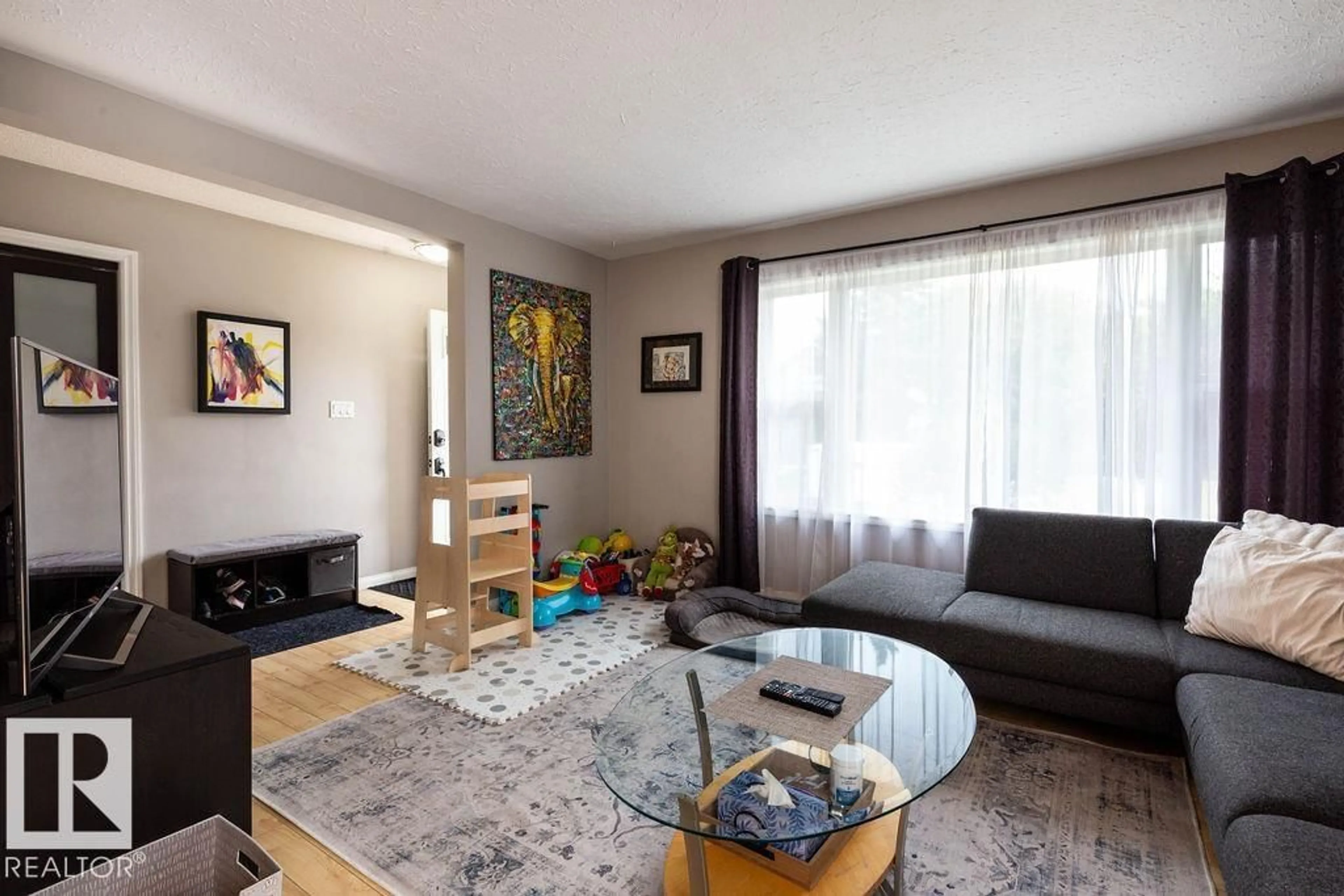 Living room with furniture, unknown for 8916 148 ST NW, Edmonton Alberta T5R1A1