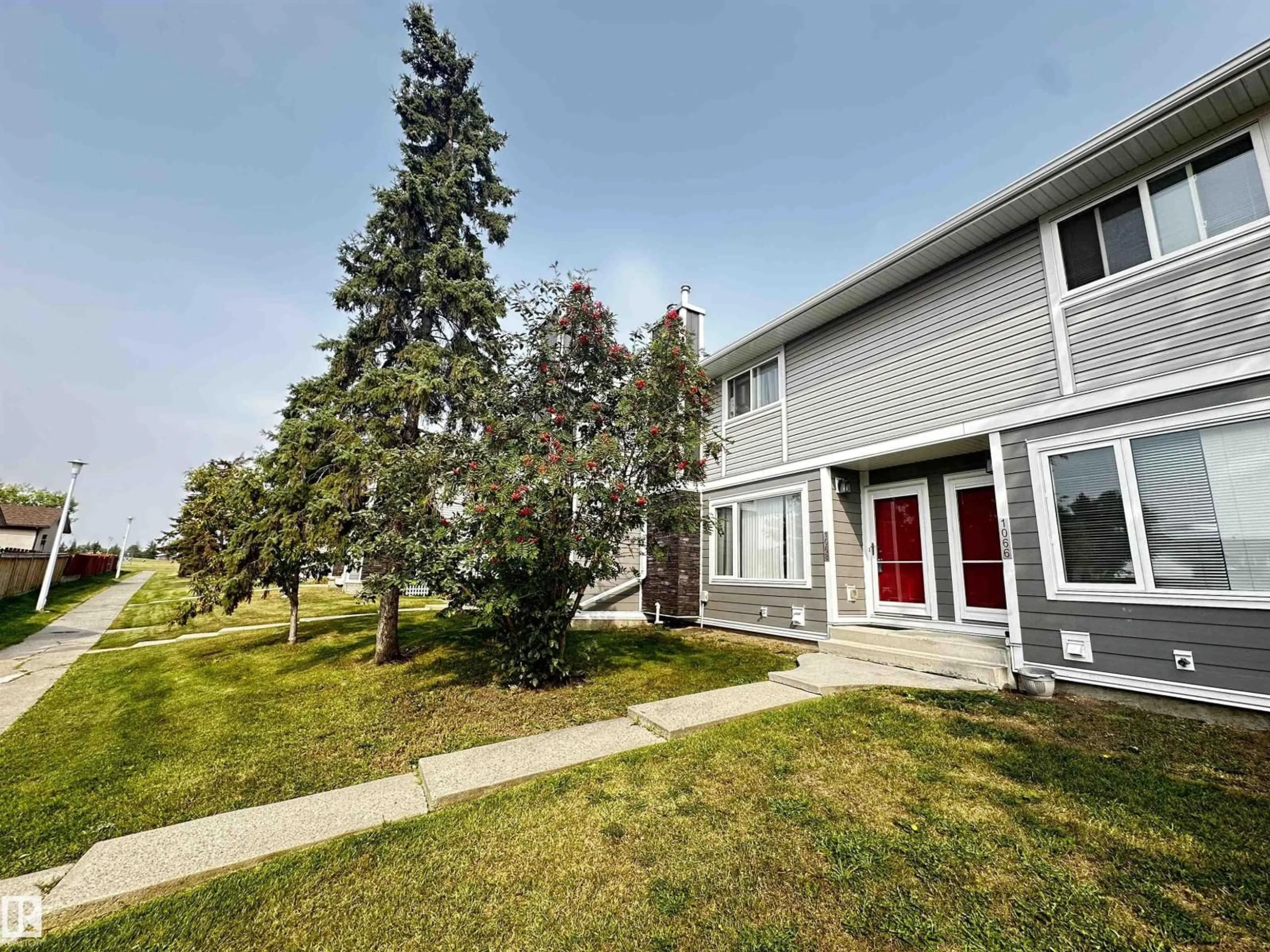 A pic from outside/outdoor area/front of a property/back of a property/a pic from drone, mountain view for 1068 LAKEWOOD RD, Edmonton Alberta T6K3T7