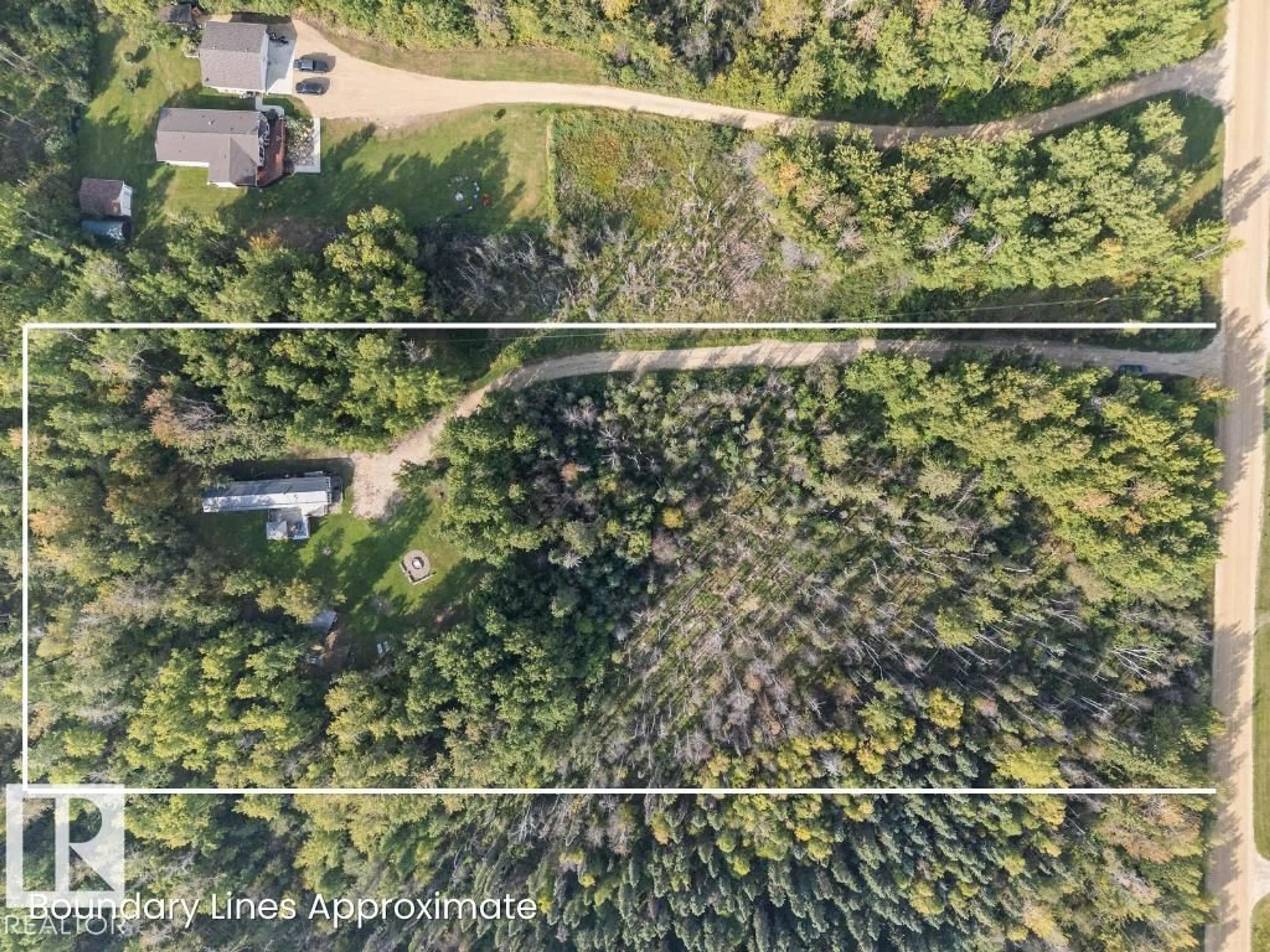 A pic from outside/outdoor area/front of a property/back of a property/a pic from drone, forest/trees view for 53319 - 327 RGE ROAD 31, Rural Parkland County Alberta T7Y0E3