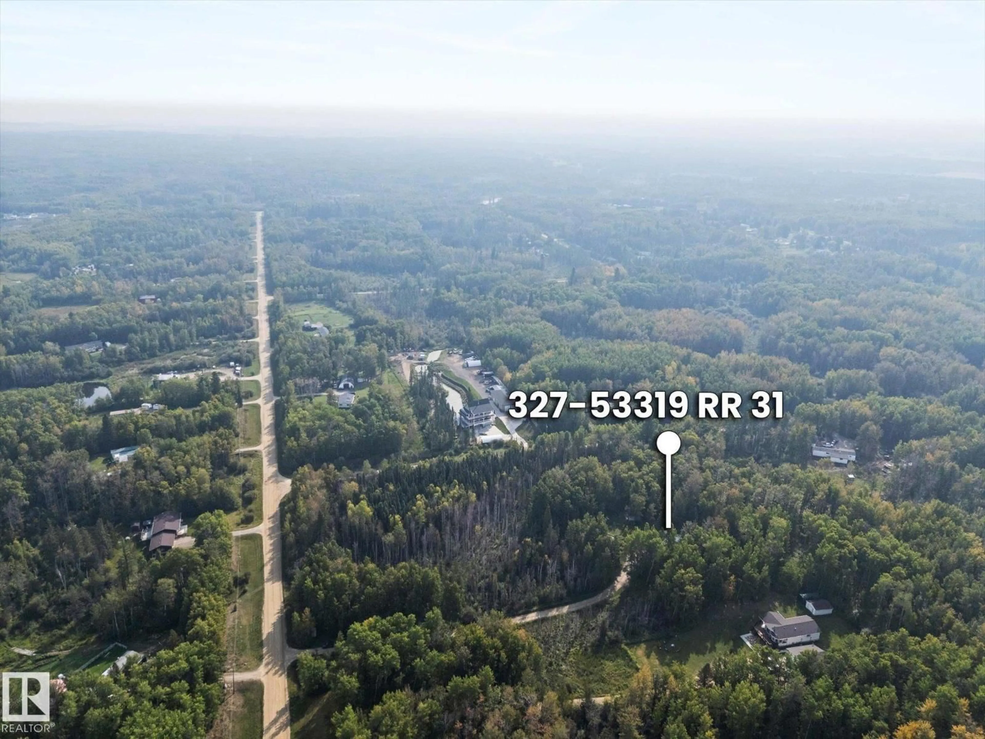 A pic from outside/outdoor area/front of a property/back of a property/a pic from drone, forest/trees view for 53319 - 327 RGE ROAD 31, Rural Parkland County Alberta T7Y0E3