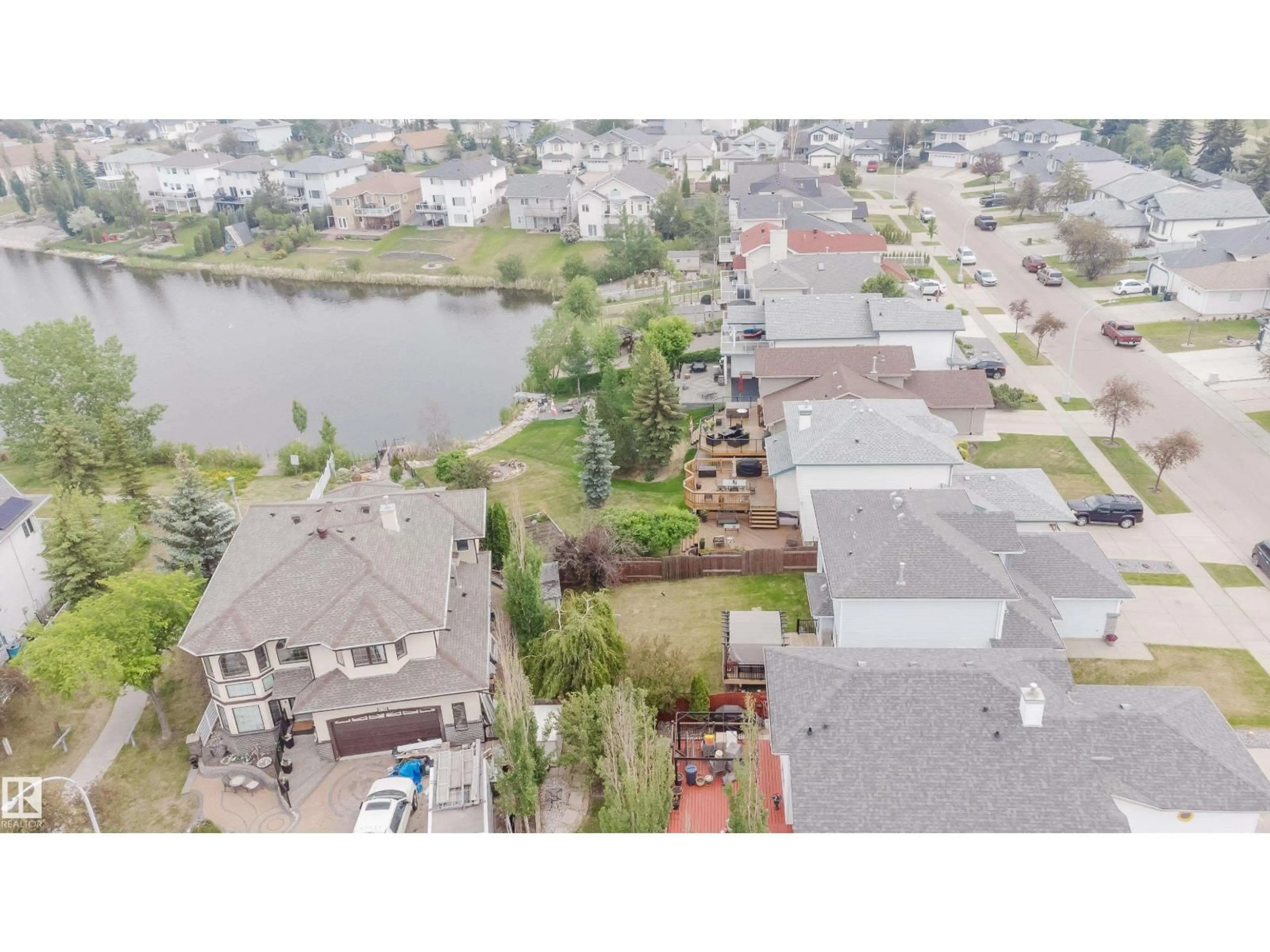 A pic from outside/outdoor area/front of a property/back of a property/a pic from drone, water/lake/river/ocean view for 442 KLARVATTEN LAKE WD, Edmonton Alberta T5Z3B9