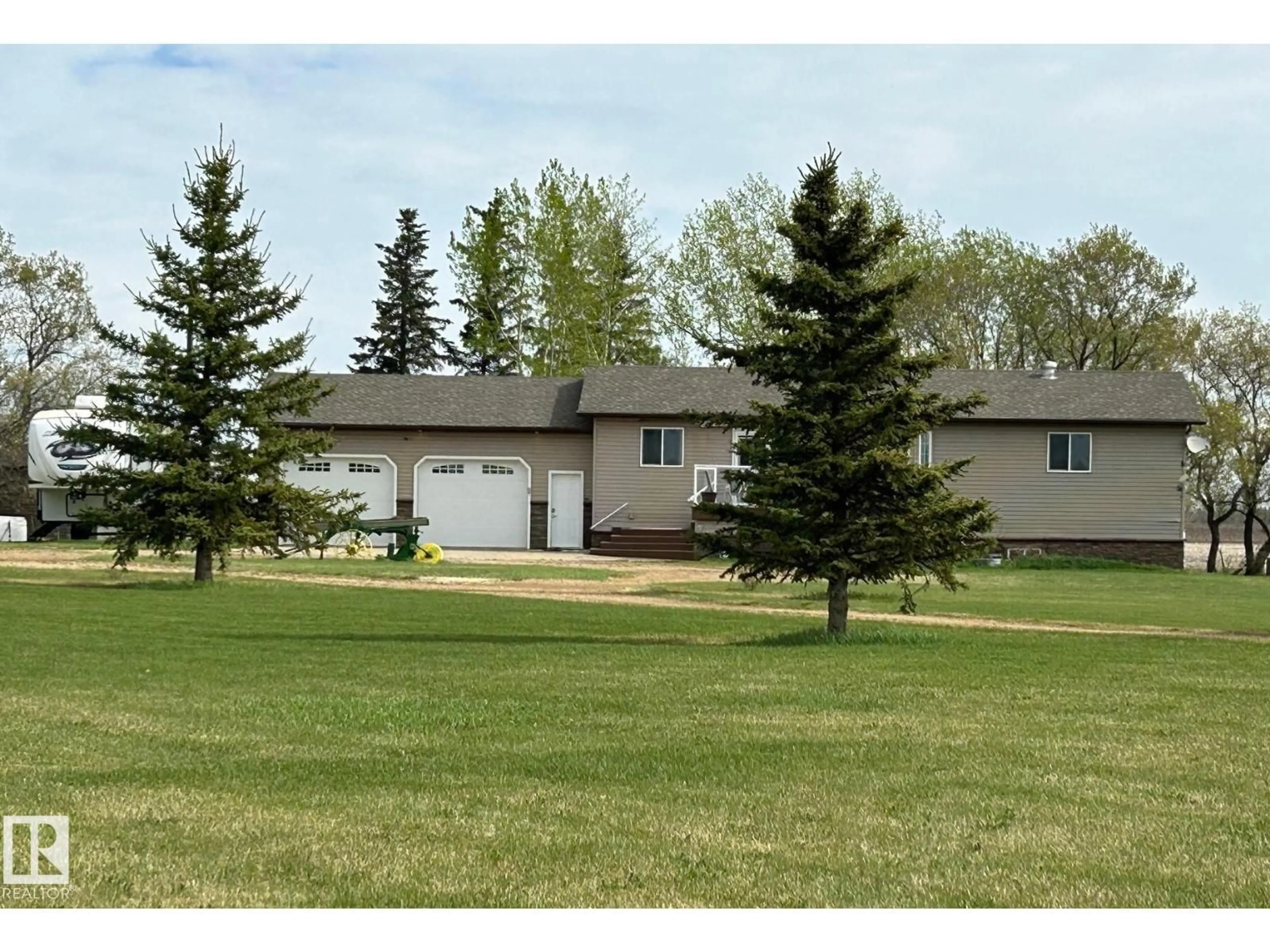 A pic from outside/outdoor area/front of a property/back of a property/a pic from drone, street for 61101 RGE RD 261, Rural Westlock County Alberta T7P2P4
