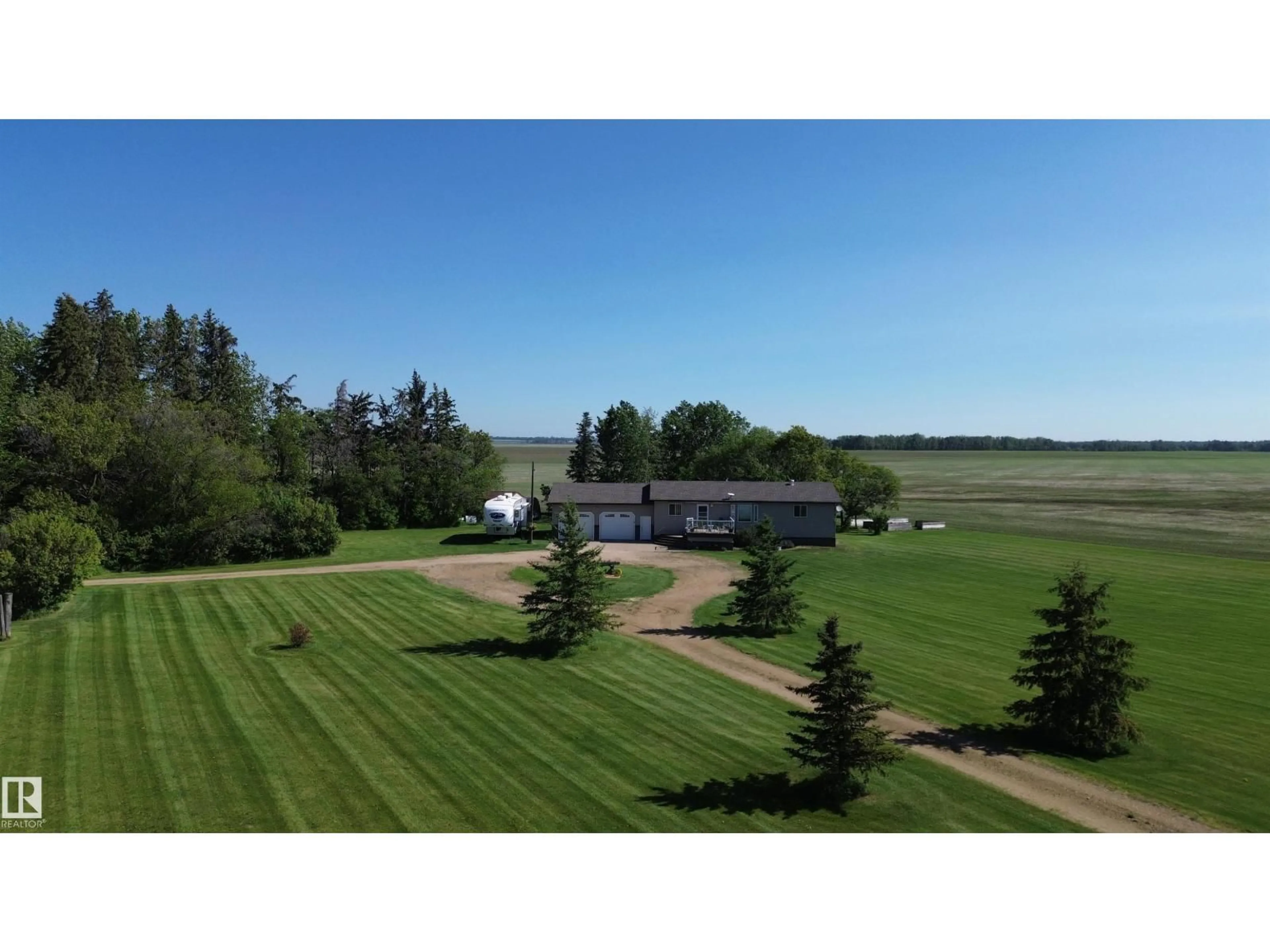 A pic from outside/outdoor area/front of a property/back of a property/a pic from drone, mountain view for 61101 RGE RD 261, Rural Westlock County Alberta T7P2P4