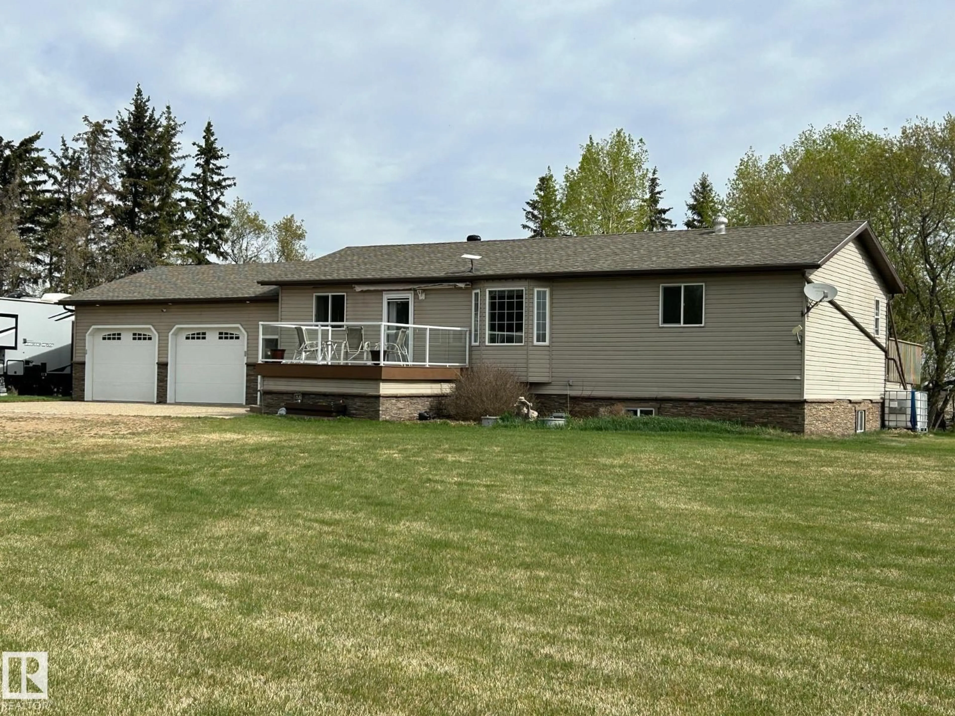 A pic from outside/outdoor area/front of a property/back of a property/a pic from drone, unknown for 61101 RGE RD 261, Rural Westlock County Alberta T7P2P4