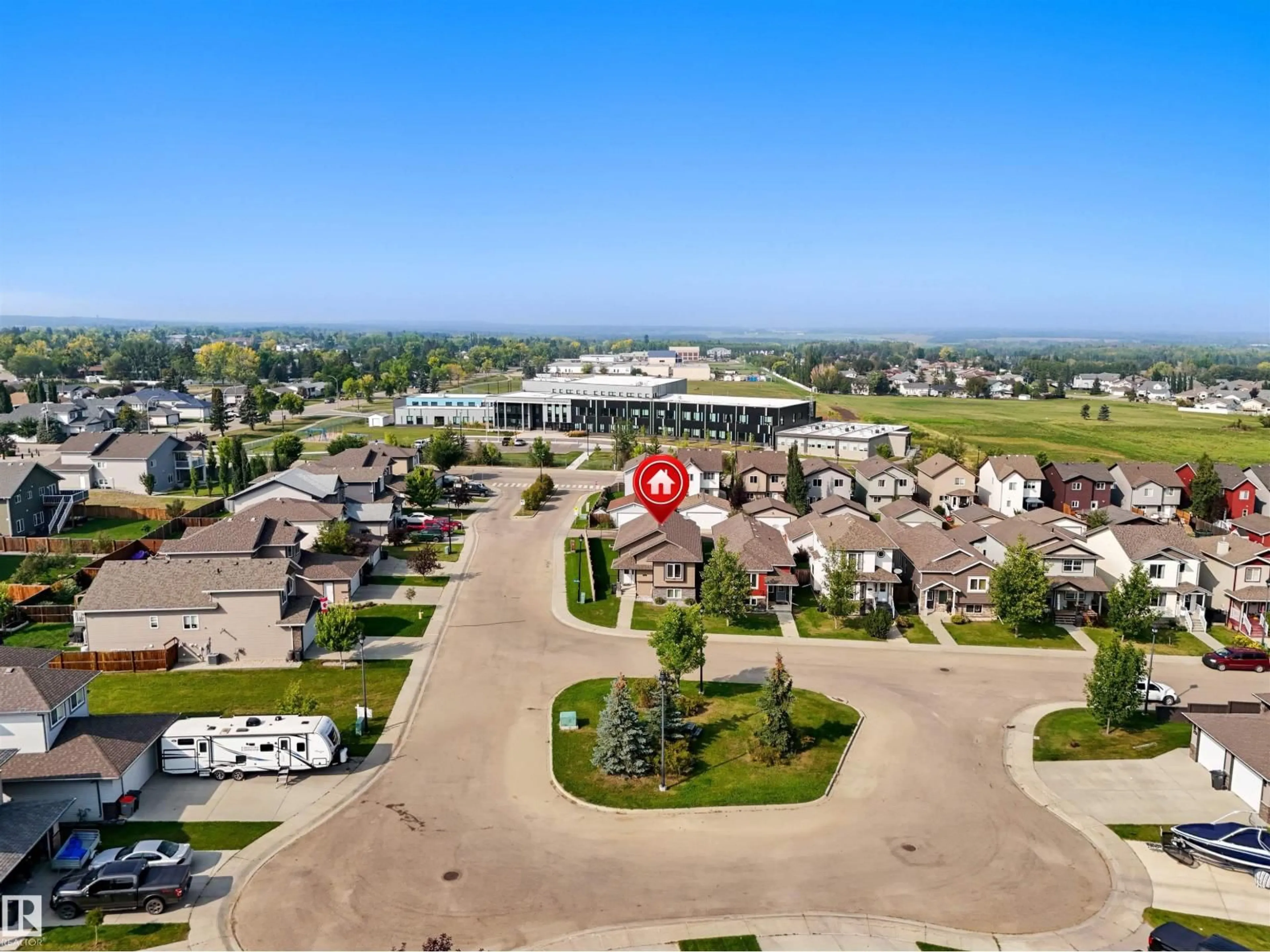 A pic from outside/outdoor area/front of a property/back of a property/a pic from drone, mountain view for 4148 41A AV, Drayton Valley Alberta T7A0B4