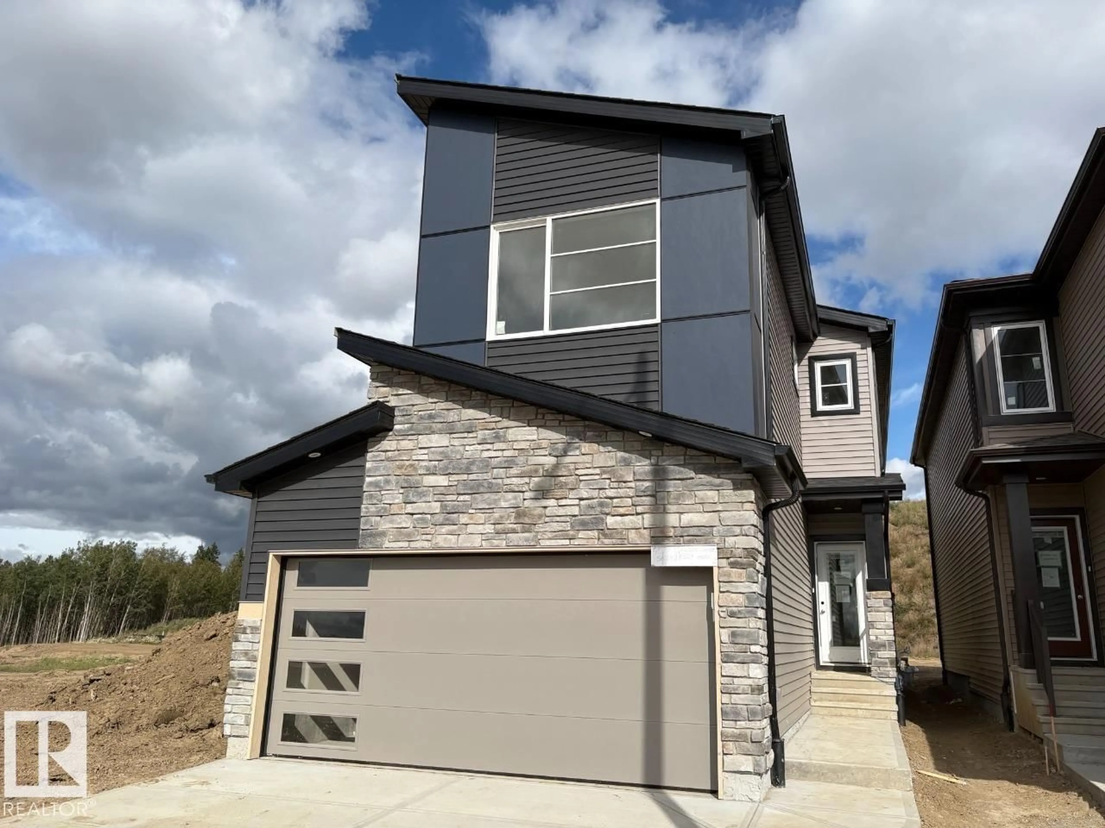 Home with brick exterior material, street for 4519 WARBLER LO, Edmonton Alberta T5S0S7