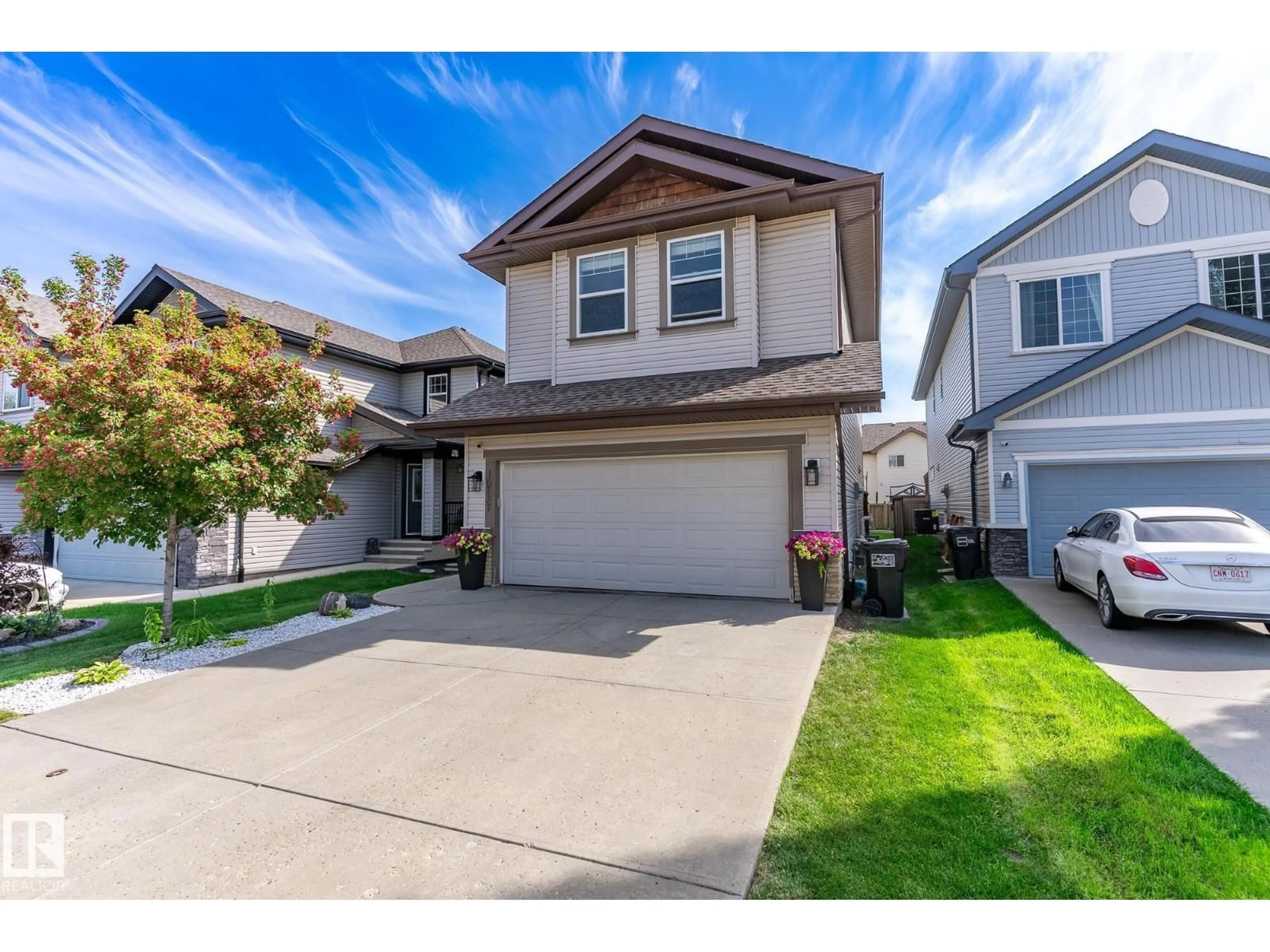 Home with vinyl exterior material, street for NW - 16737 58B ST, Edmonton Alberta T5Y0N3