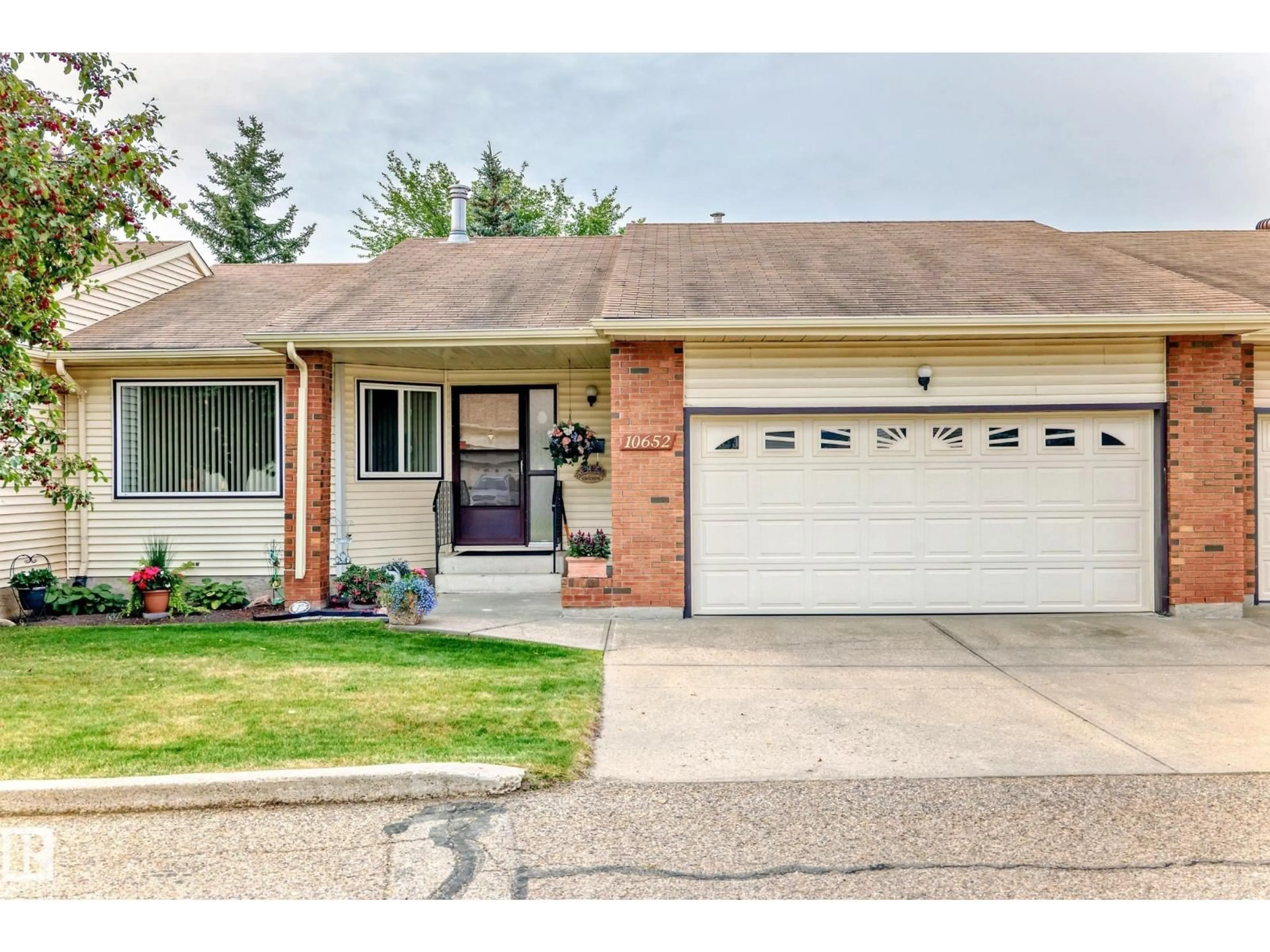 Home with brick exterior material, street for 10652 153 AV, Edmonton Alberta T5X5R8