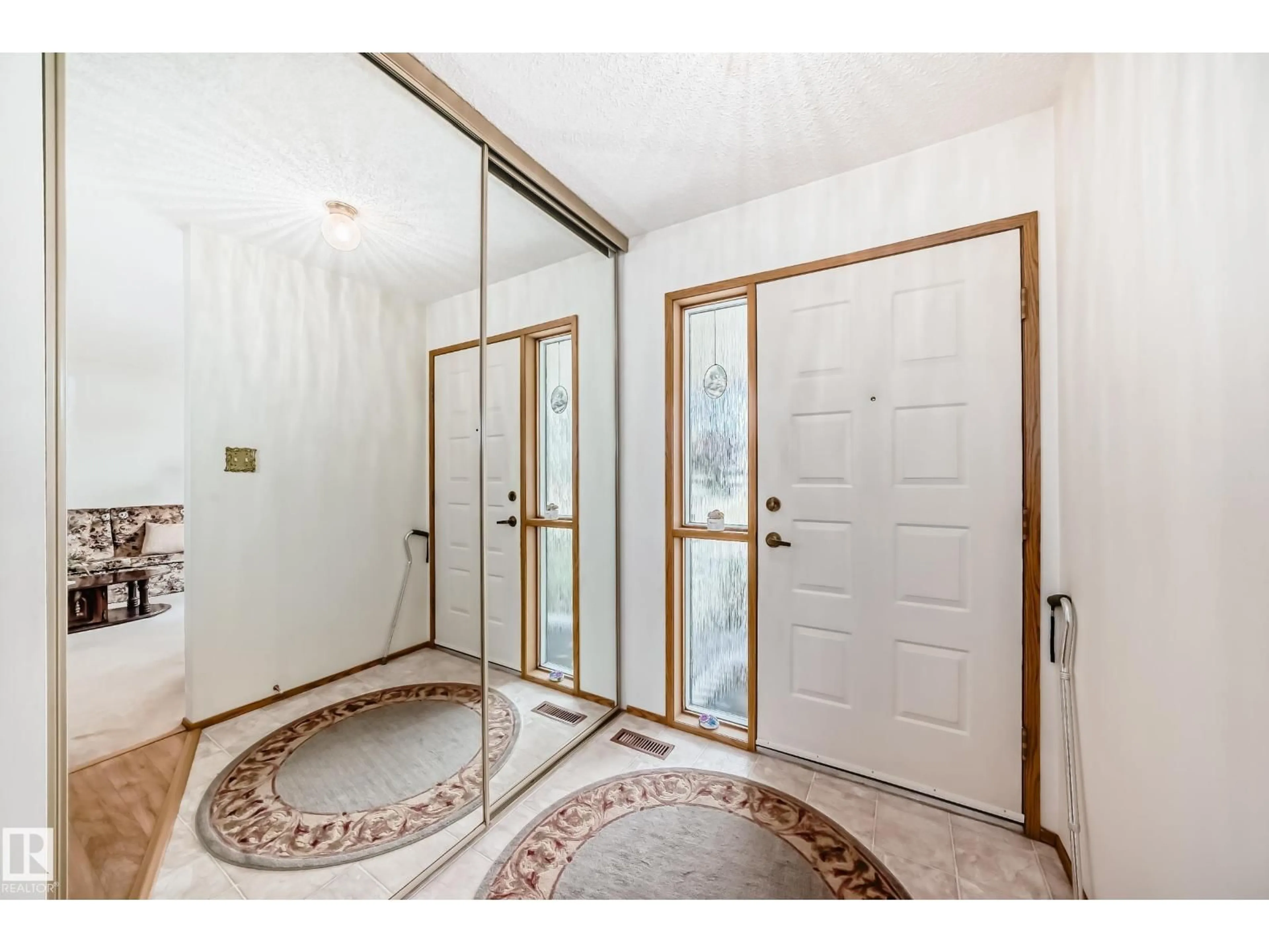 Indoor entryway for 10652 153 AV, Edmonton Alberta T5X5R8