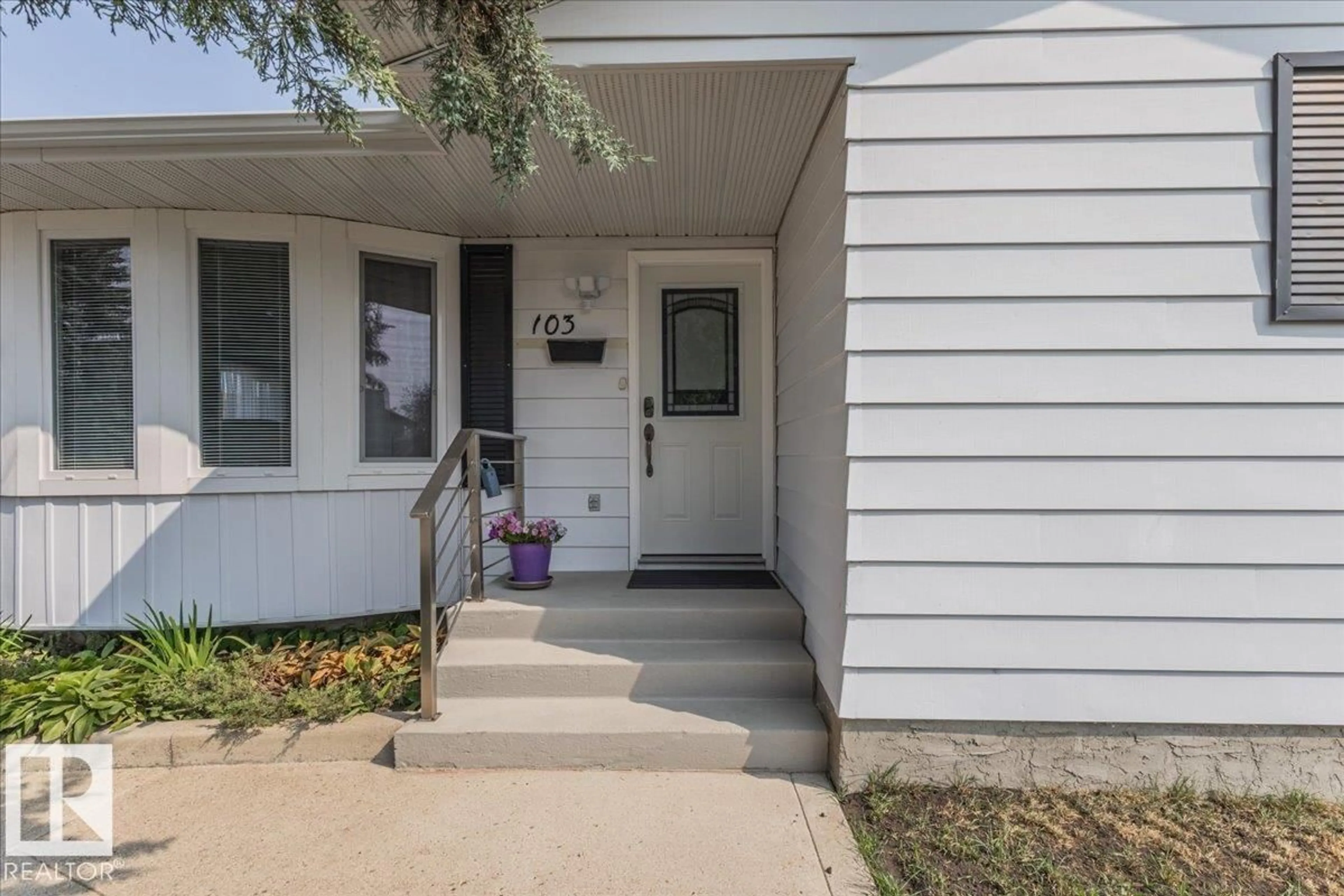 Home with vinyl exterior material, street for 103 PINE DR, Wetaskiwin Alberta T9A2V8