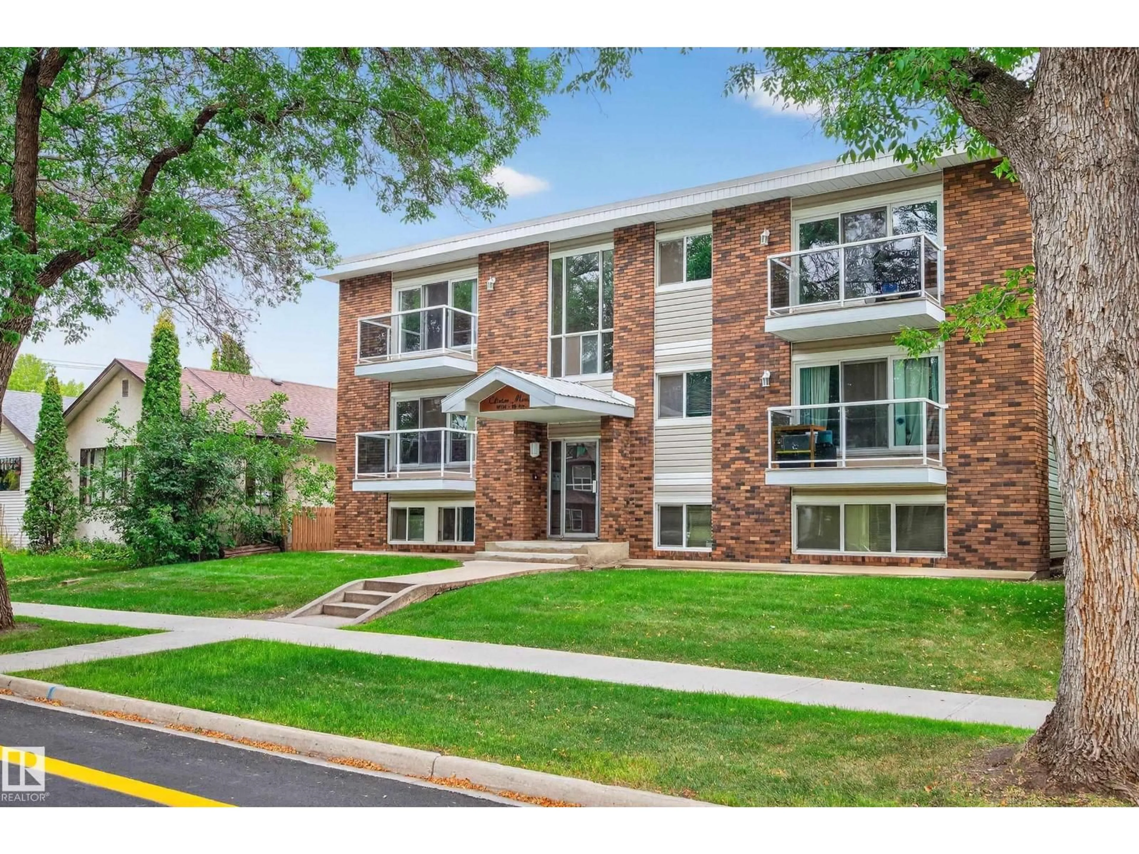 Home with brick exterior material, street for 202 - 10746 80 AV, Edmonton Alberta T6E1V8