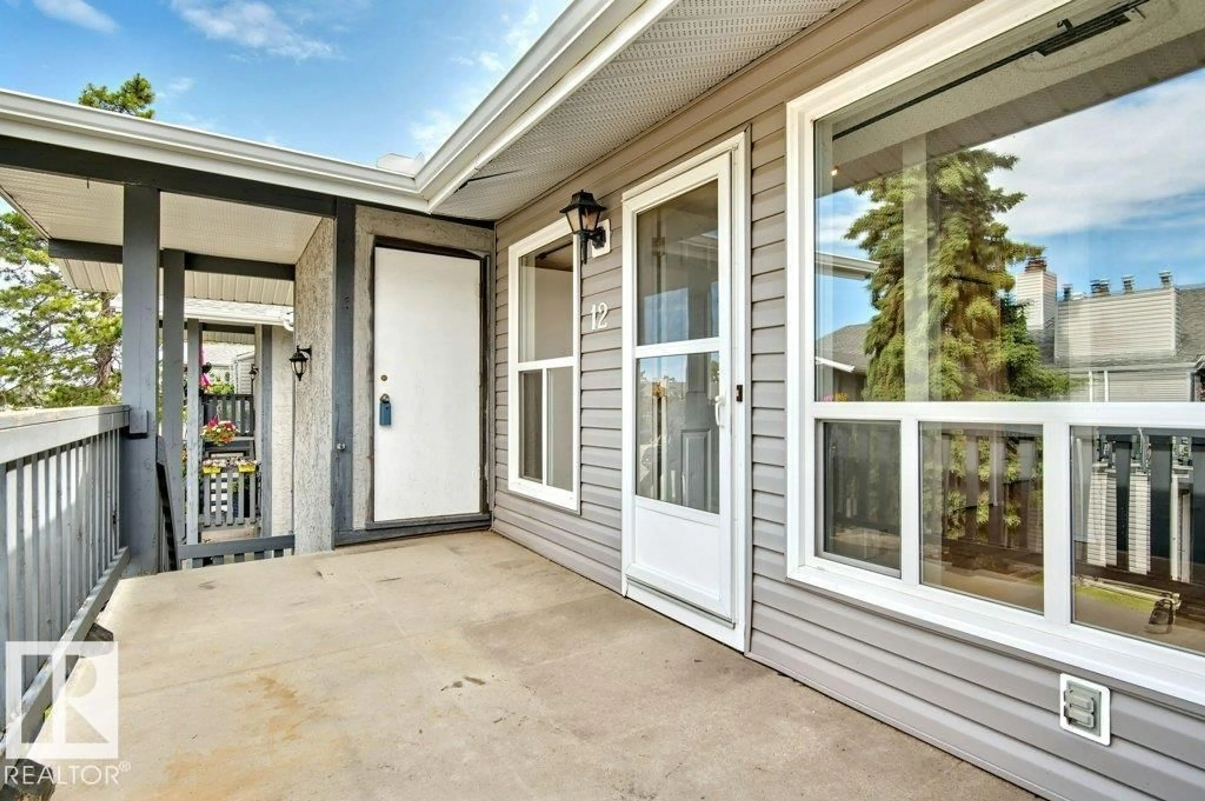 Home with vinyl exterior material, street for 1503 MILL WOODS NW, Edmonton Alberta T6L4C2