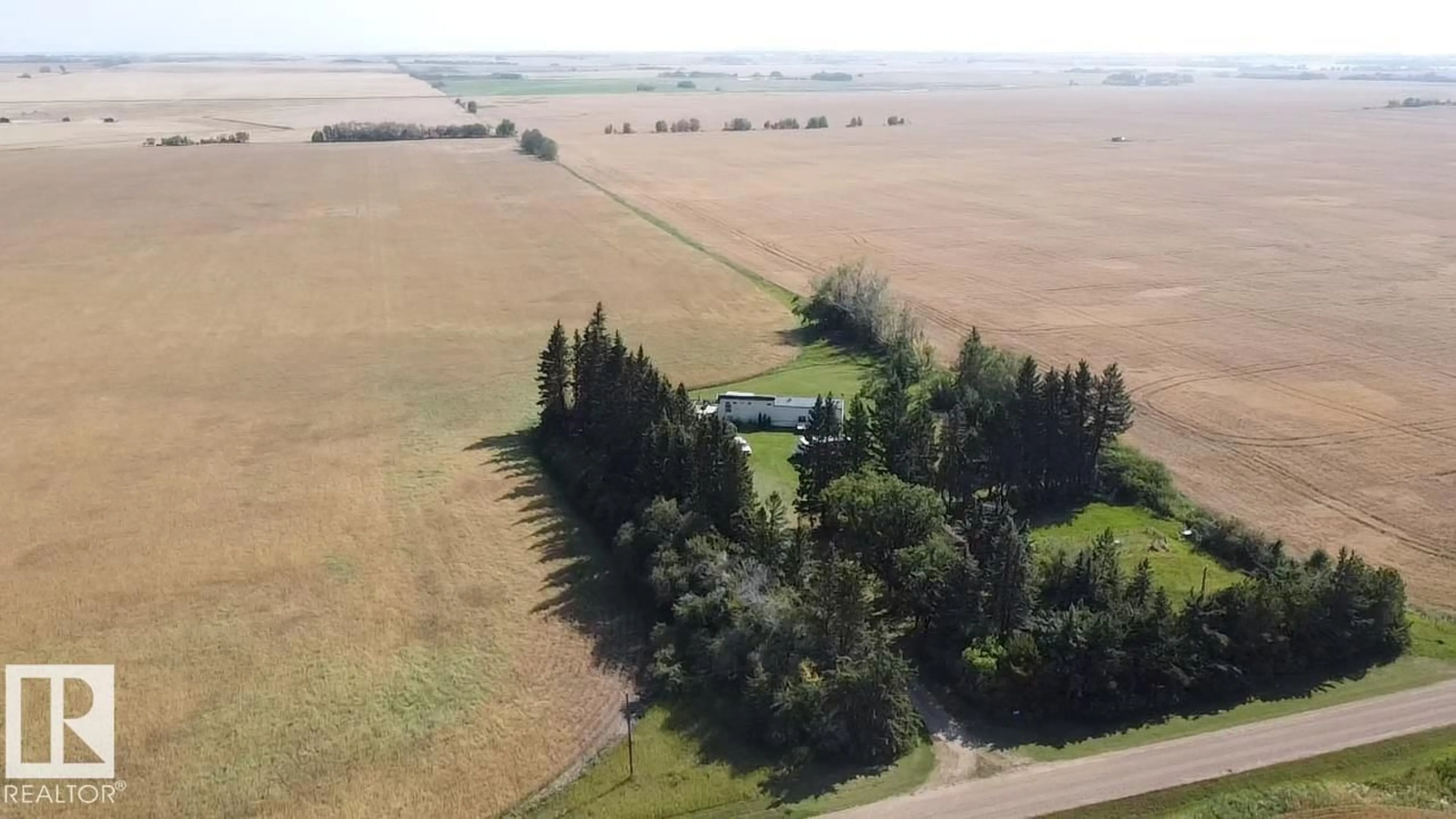 A pic from outside/outdoor area/front of a property/back of a property/a pic from drone, unknown for 163 RANGE RD, Rural Lamont County Alberta T0B0C0