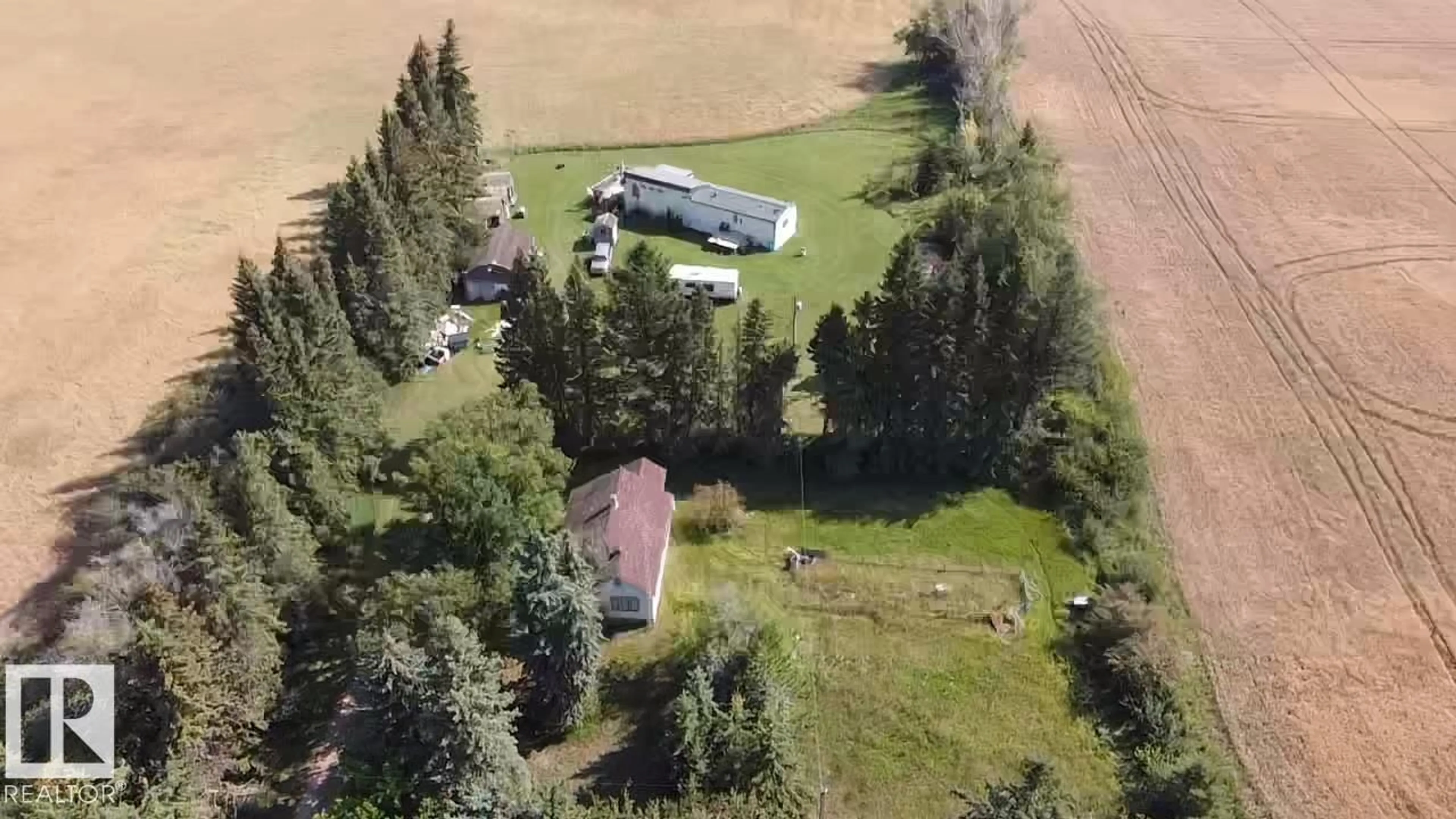 A pic from outside/outdoor area/front of a property/back of a property/a pic from drone, unknown for 163 RANGE RD, Rural Lamont County Alberta T0B0C0