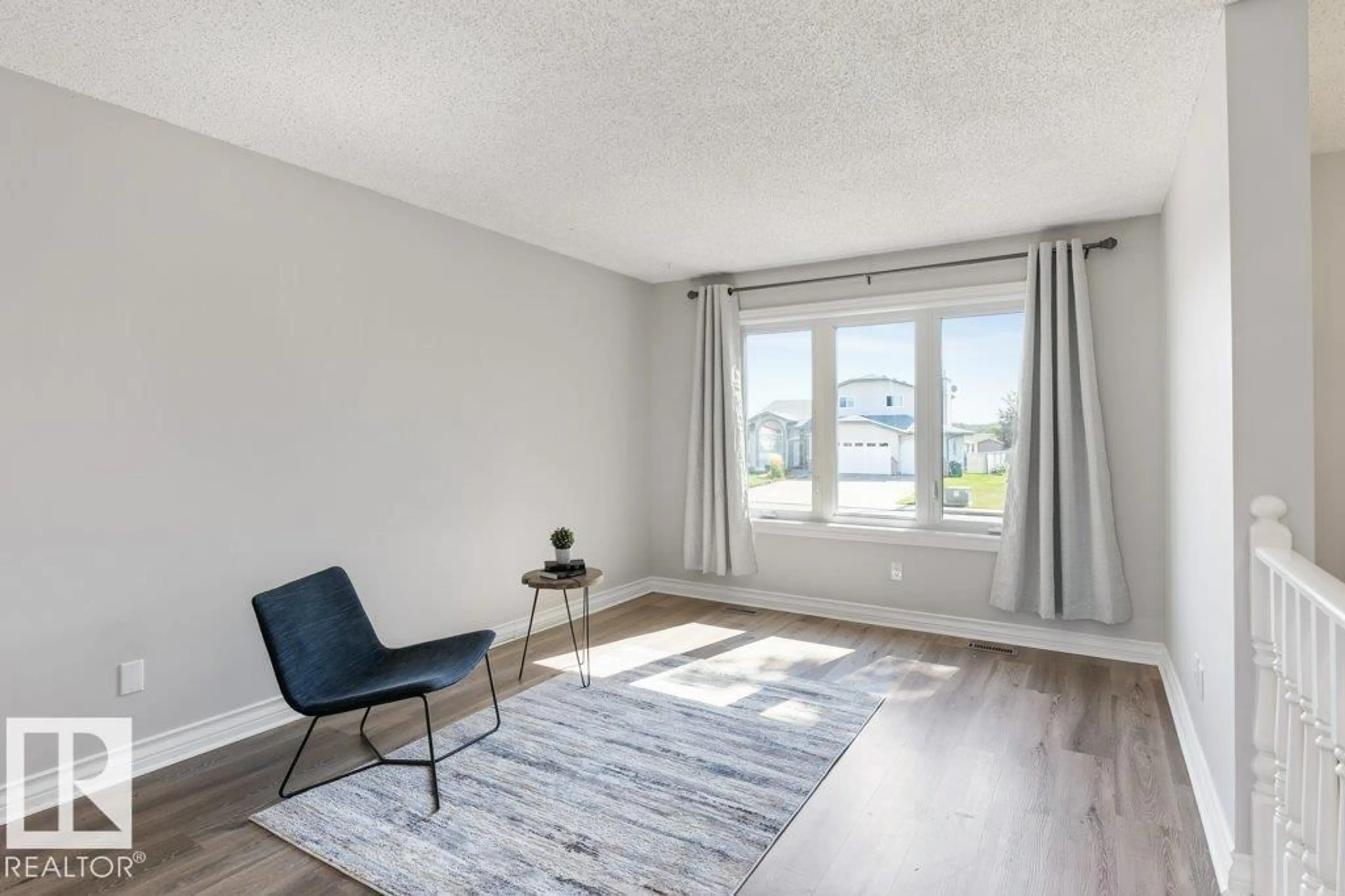 Living room with furniture, unknown for 406 GRANDIN DR, Morinville Alberta T8R1J1