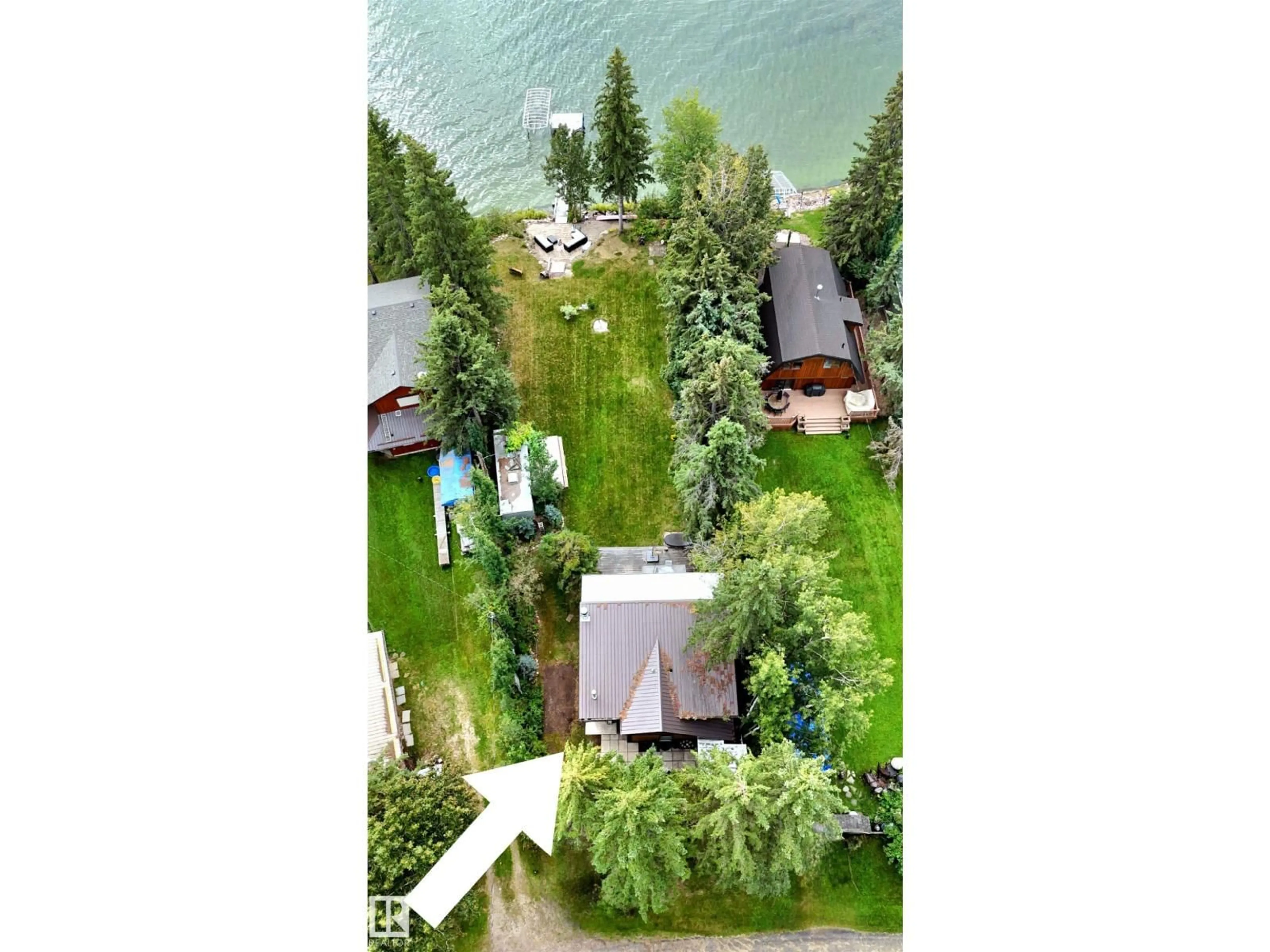 A pic from outside/outdoor area/front of a property/back of a property/a pic from drone, water/lake/river/ocean view for 190 GILWOOD BE, Rural Leduc County Alberta T0C2V0