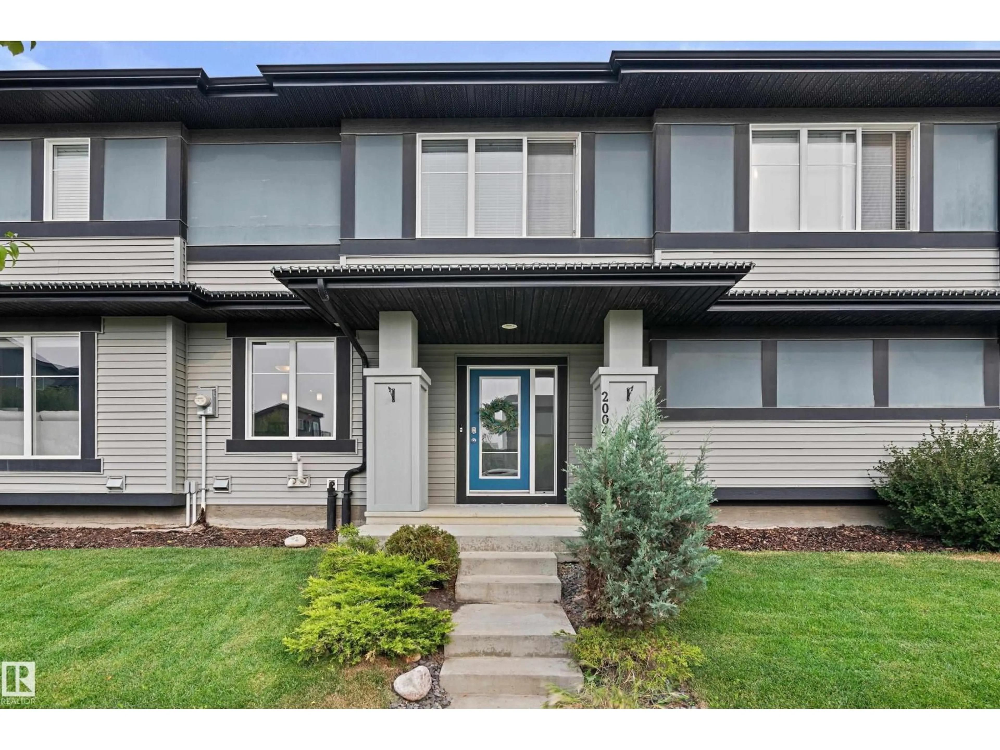 Home with vinyl exterior material, street for SW - 2004 PRICE LD, Edmonton Alberta T6W3P9